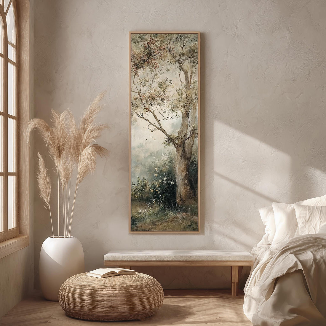 a large painting of a tree hanging on a wall, with a cozy seating area and decorative elements such as vases and a potted plant in the background.
