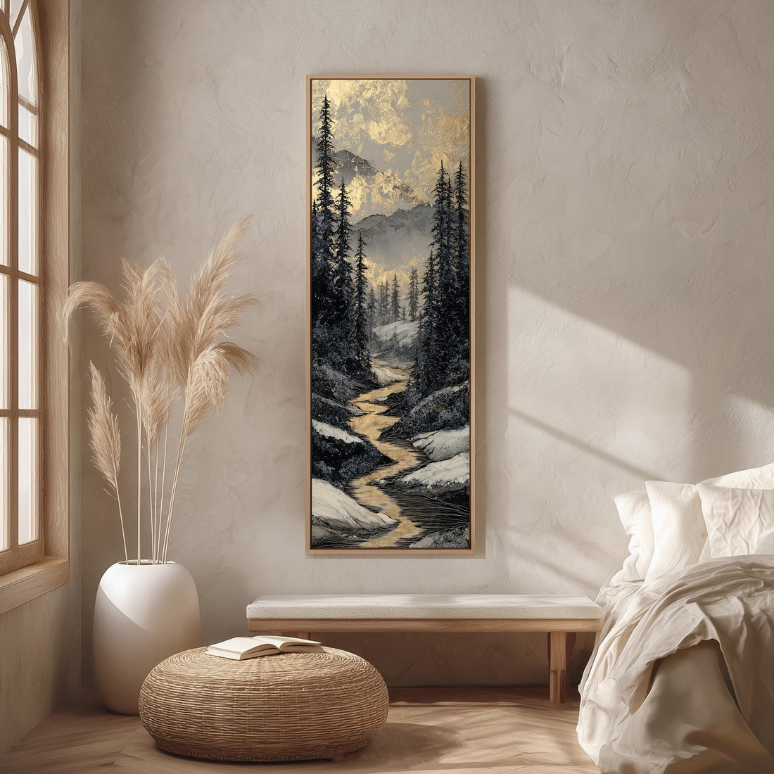 a serene bedroom scene with a large painting of a snowy mountain landscape hanging on the wall. The painting is framed in gold and depicts a winding path through a forest of pine trees. The room is decorated with a large window, a white vase with potted plants, and a wooden bench. The overall atmosphere of the room is calm and peaceful, with the painting serving as a focal point.
