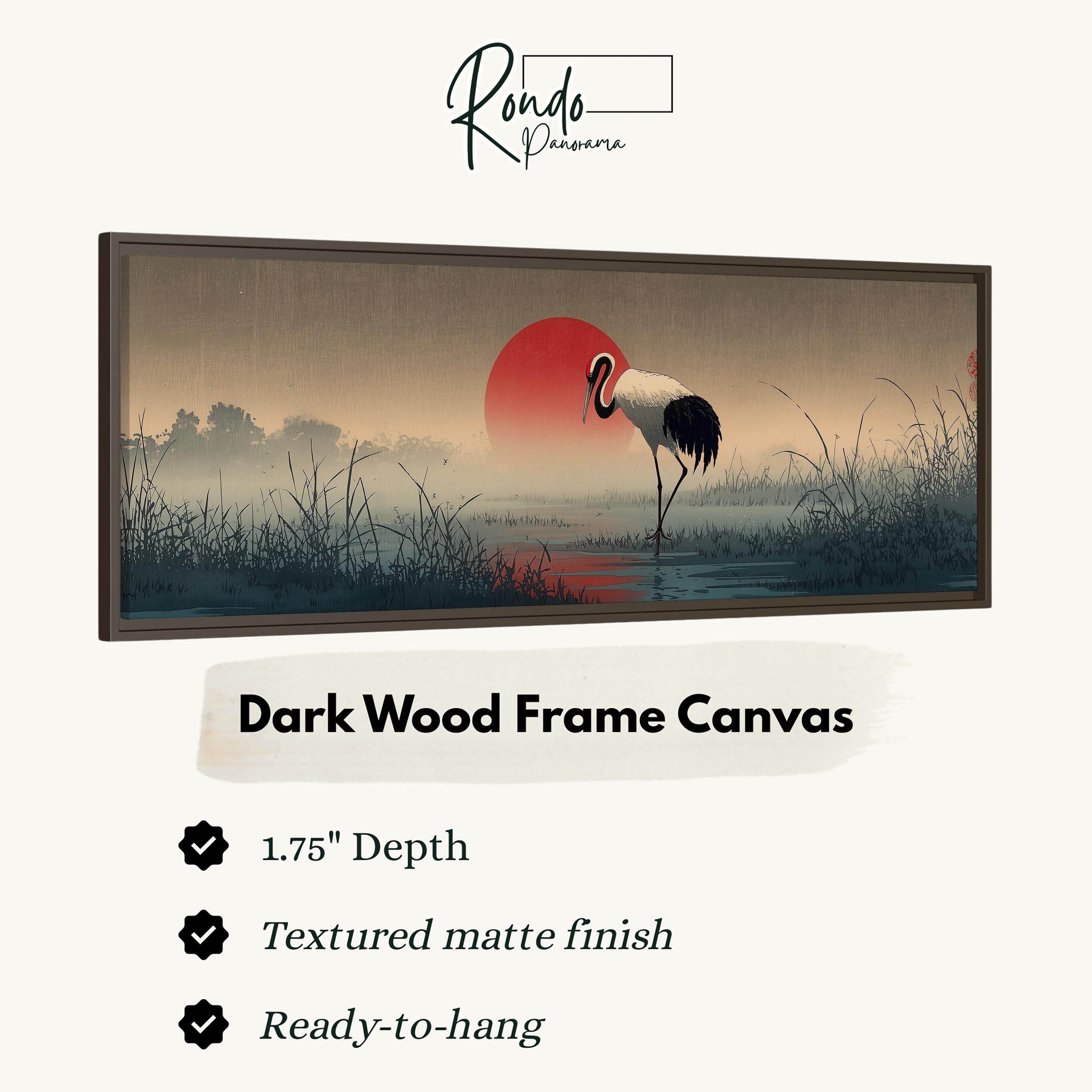 The image is a framed artwork depicting a crane standing in a misty landscape with a red sun in the background.