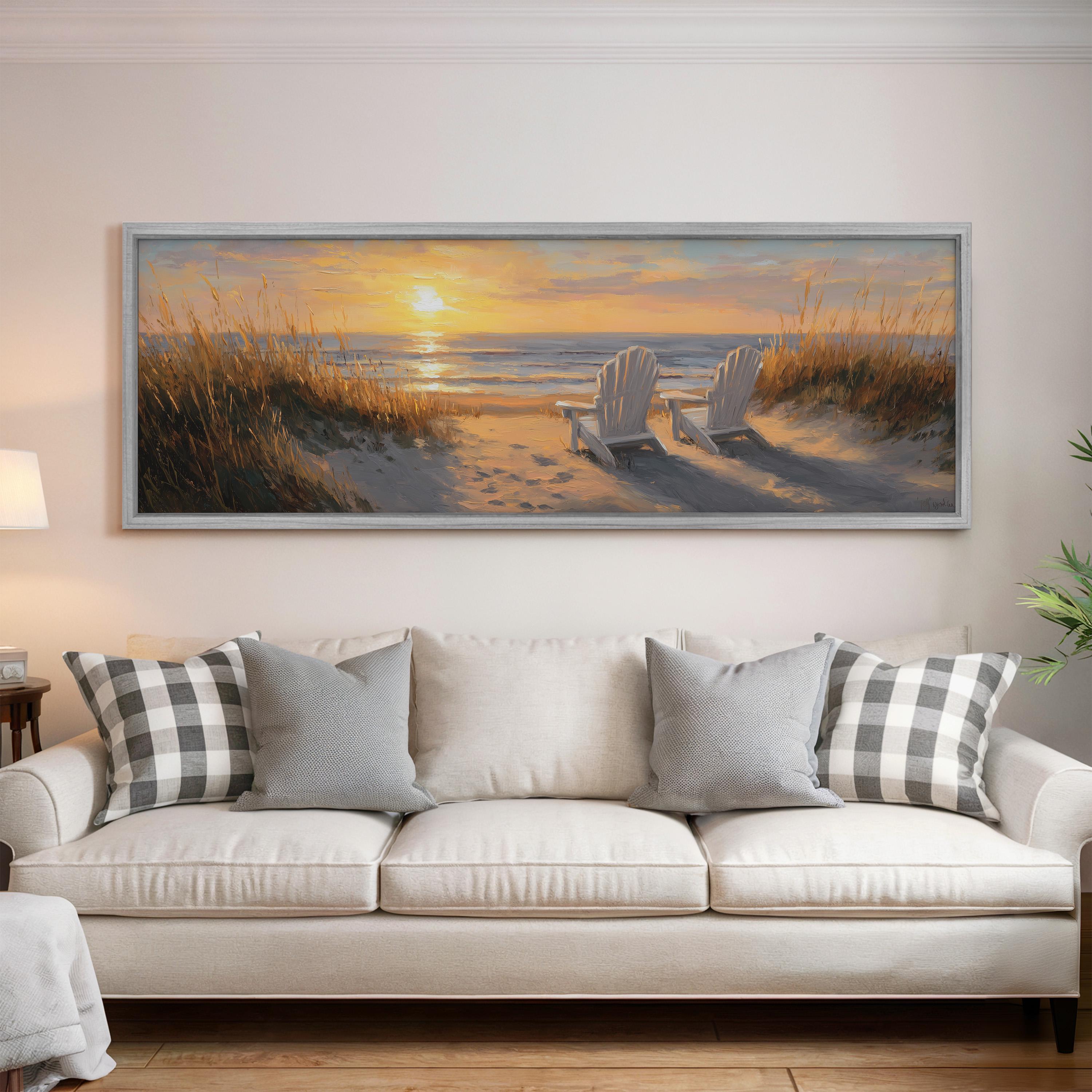 a large painting of a beach scene with two white chairs and a couch in a living room setting.