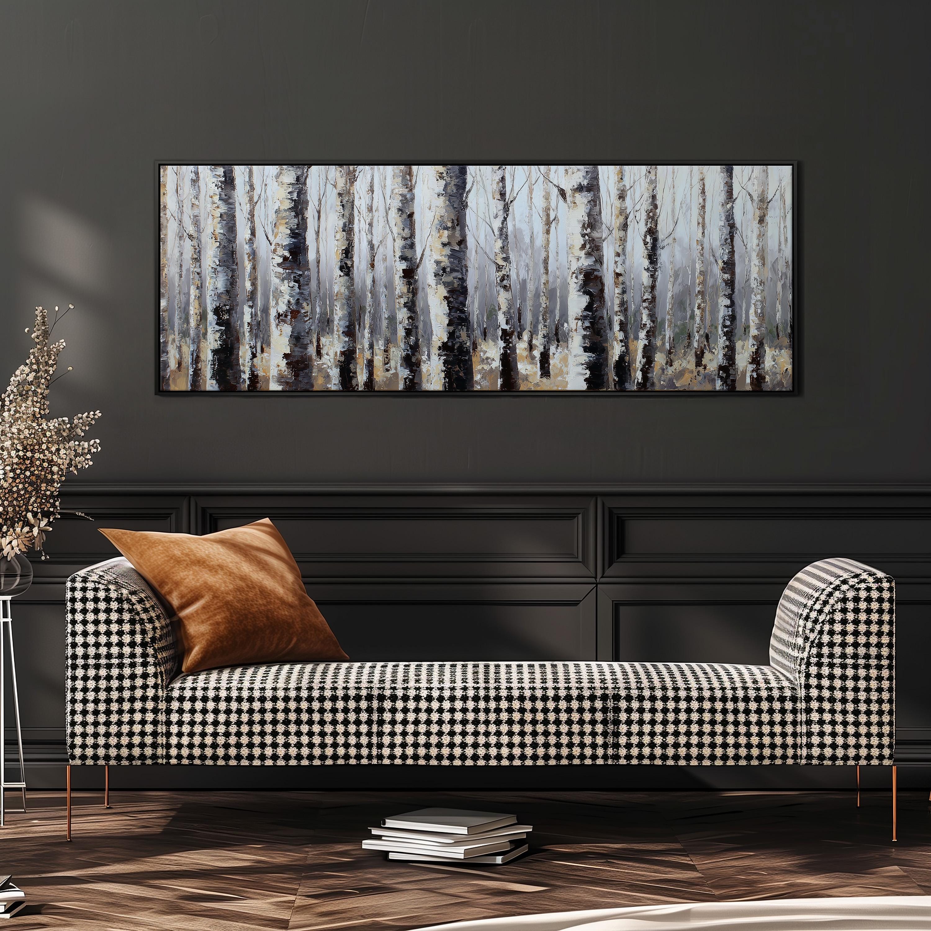 a black and white checkered sofa with a brown throw pillow, set against a dark wall with a large painting of a forest scene above it.