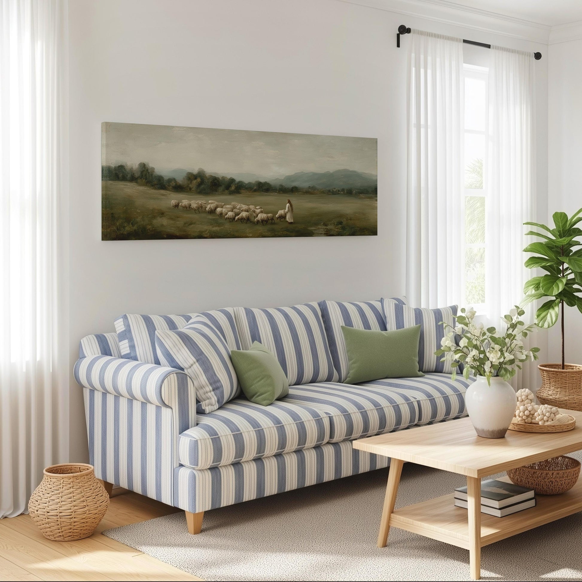 a cozy living room with a striped blue and white sofa, a wooden coffee table, and a painting of a pastoral scene hanging on the wall.
