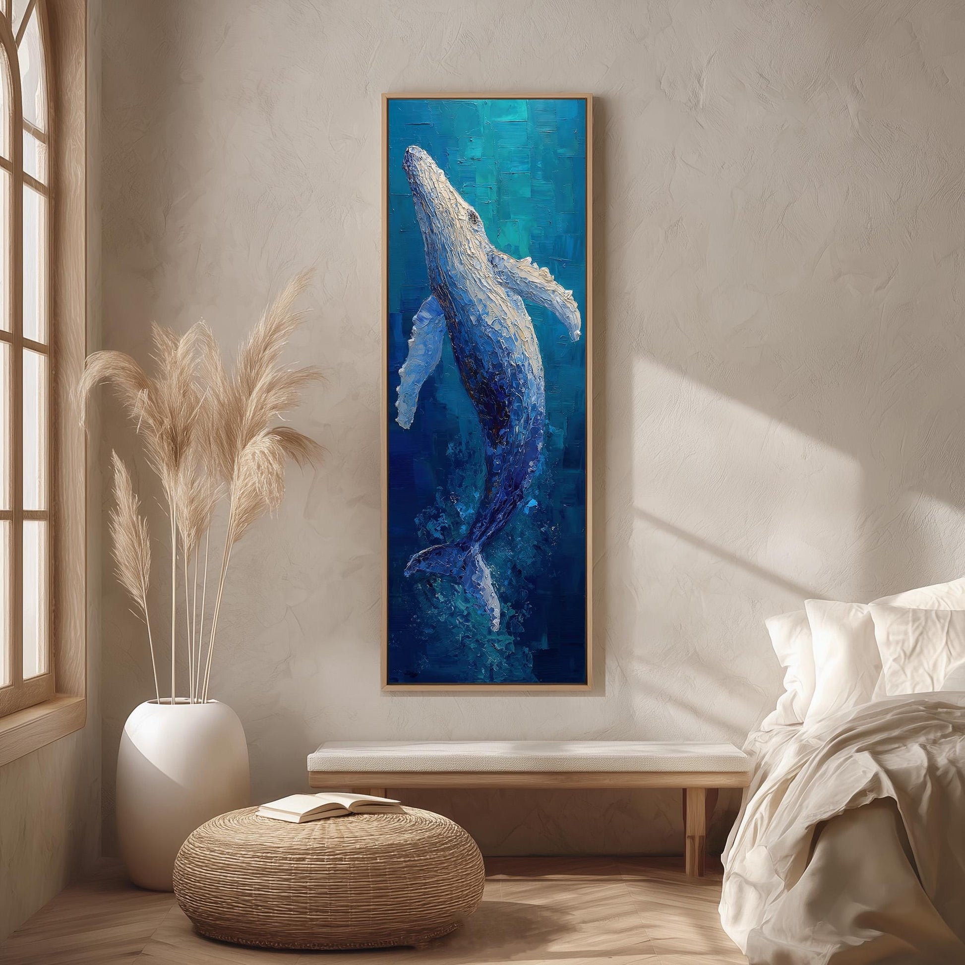 a large painting of a whale in the center of a room with a window, a white bed, a wicker ottoman, and a potted plant.