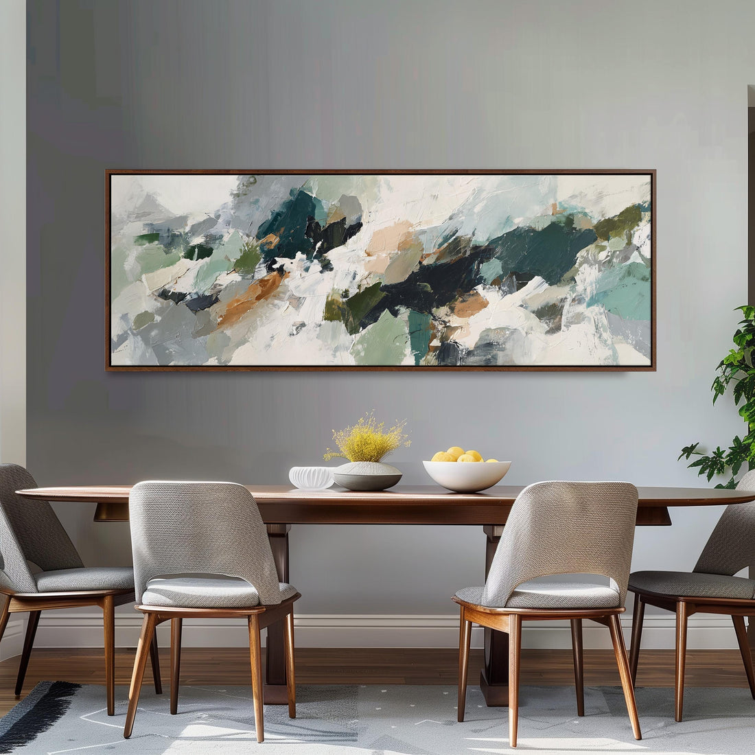 a large abstract painting hanging on a wall above a white sofa with gray and white plaid throw pillows.
