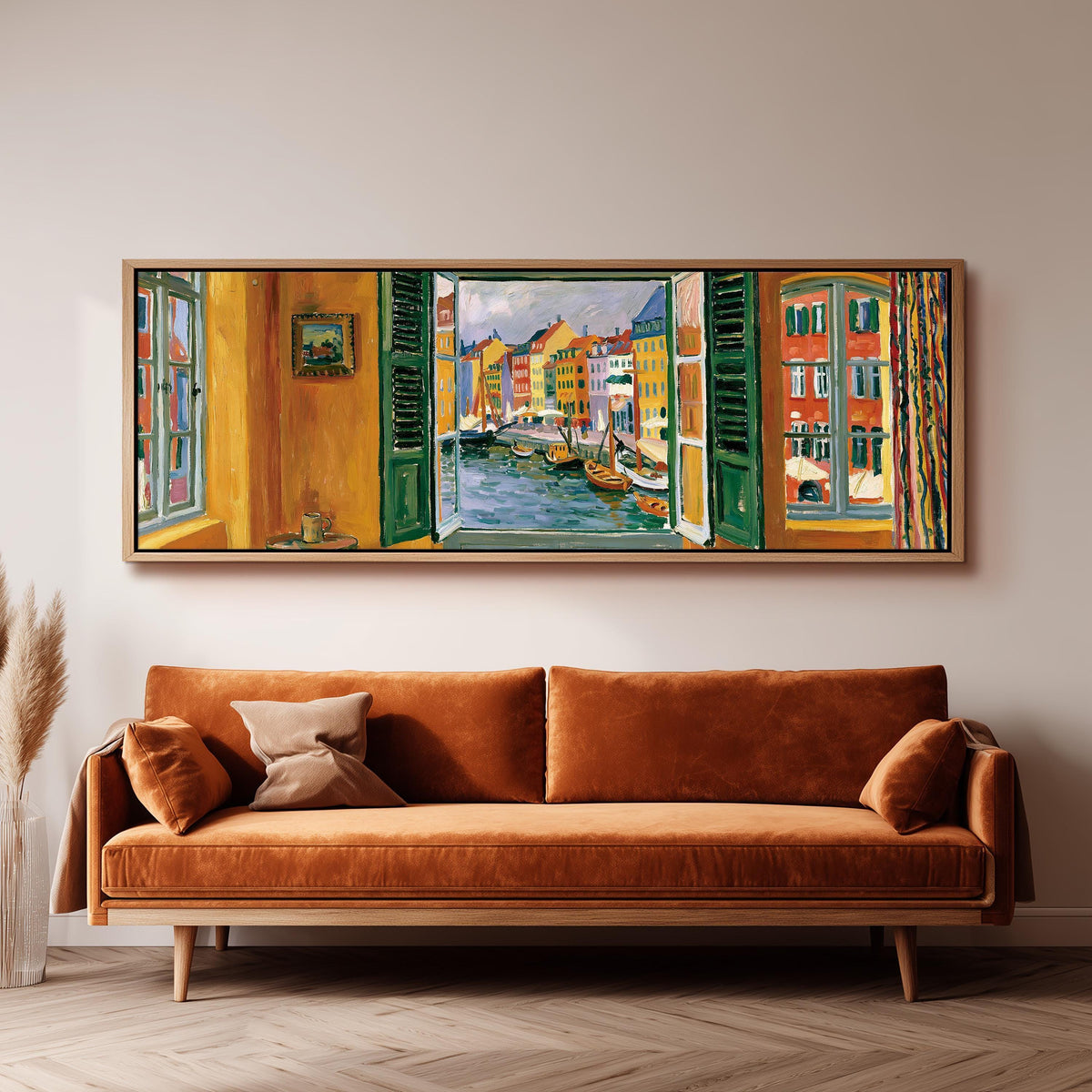 Copenhagen's colorful canal through a window panoramic canvas print above a sofa in a living room