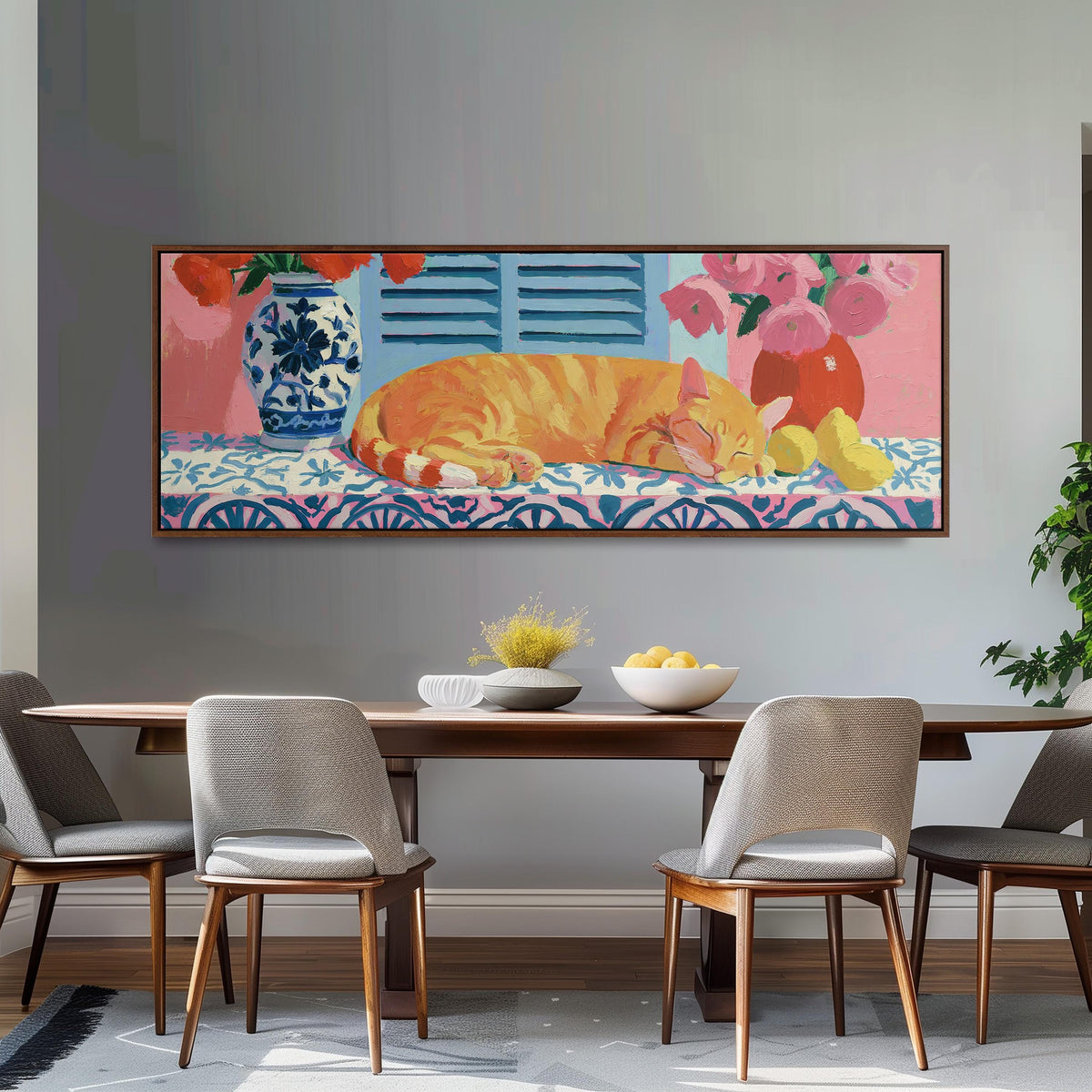 Orange cat napping on a tiled table long horizontal canvas print above a dining table