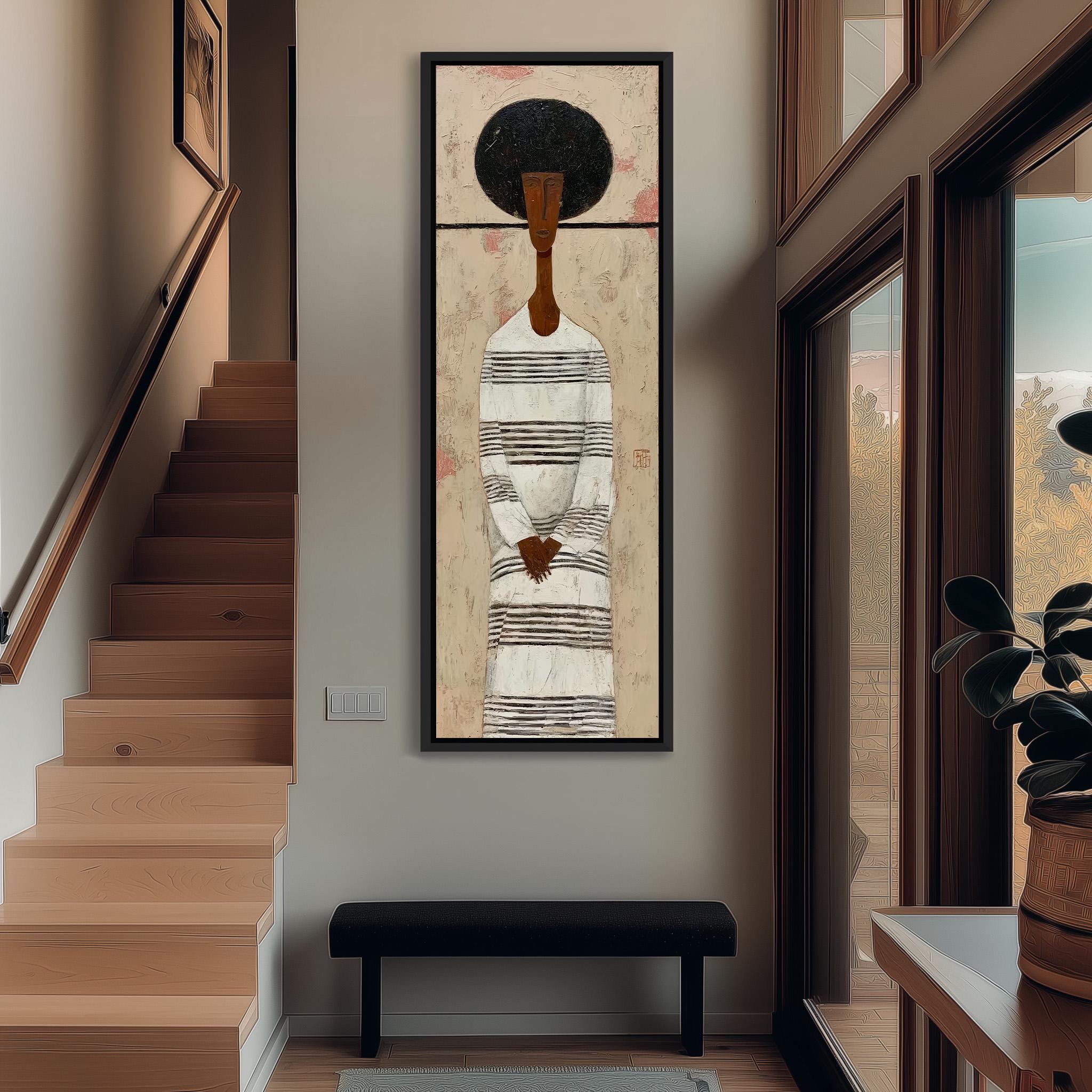 a large painting of a woman with a black afro hairstyle, hanging on a wall in a hallway. The painting is framed and appears to be the focal point of the room.