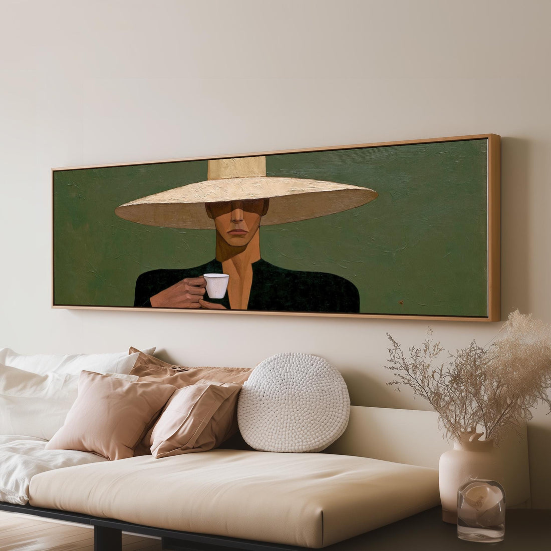 Shadowed woman in a sun hat with espresso long horizontal canvas print above a sofa in a living room