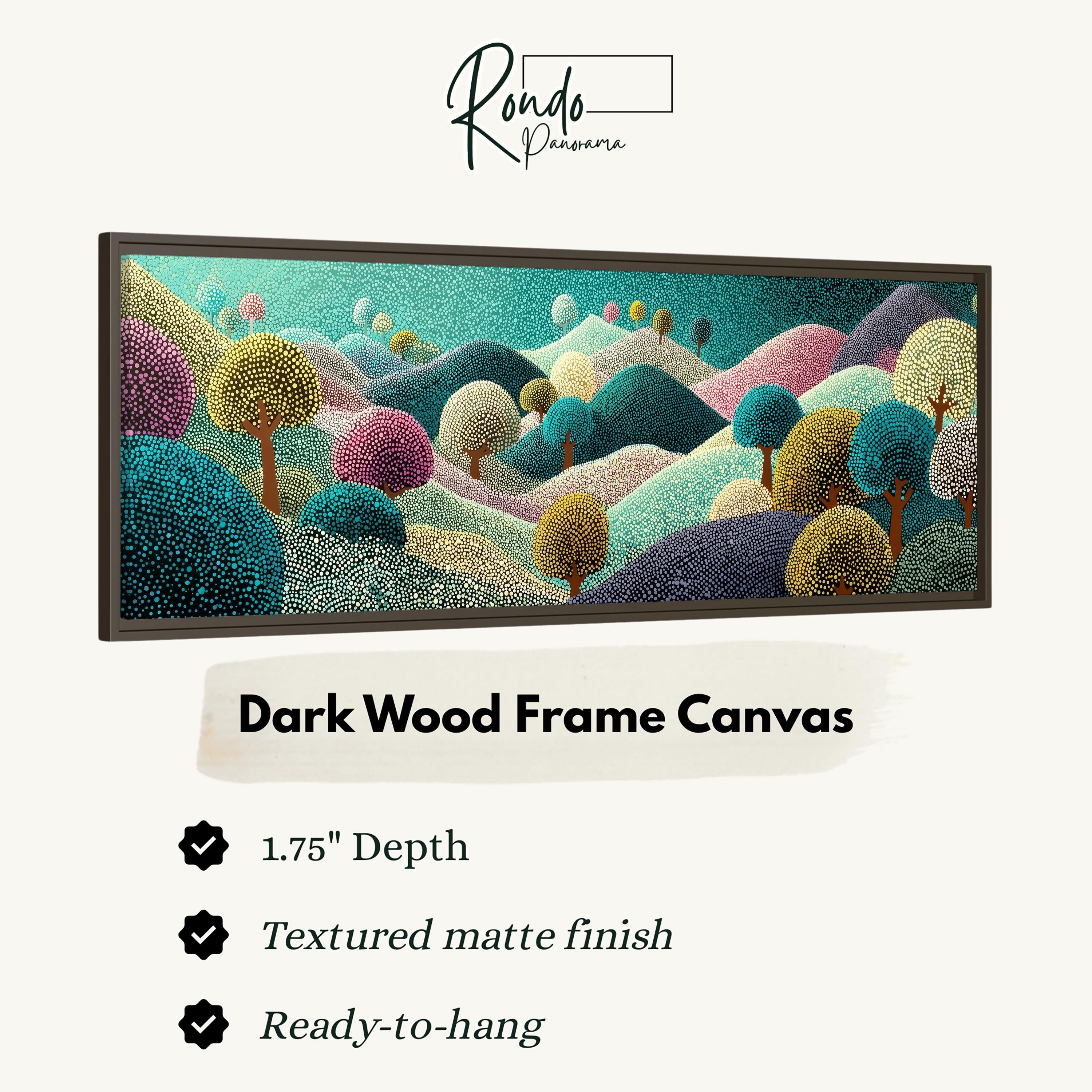 The image is a framed canvas depicting a vibrant, colorful landscape with trees and hills. The frame is described as a dark wood frame, with a 1.75" depth and a textured matte finish. It is ready to hang.