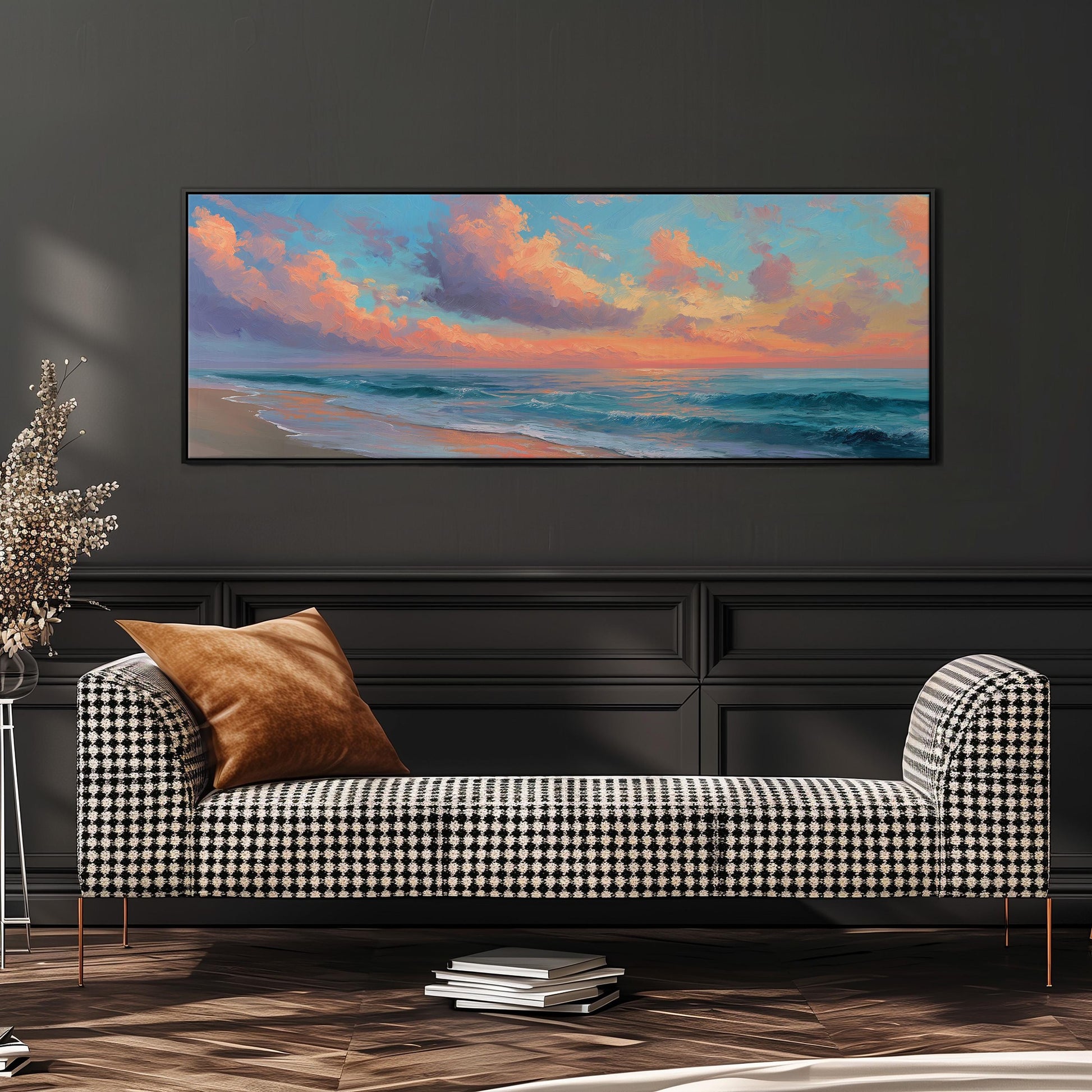 a large, rectangular painting of a beach scene hanging on a wall above a black and white checkered sofa.