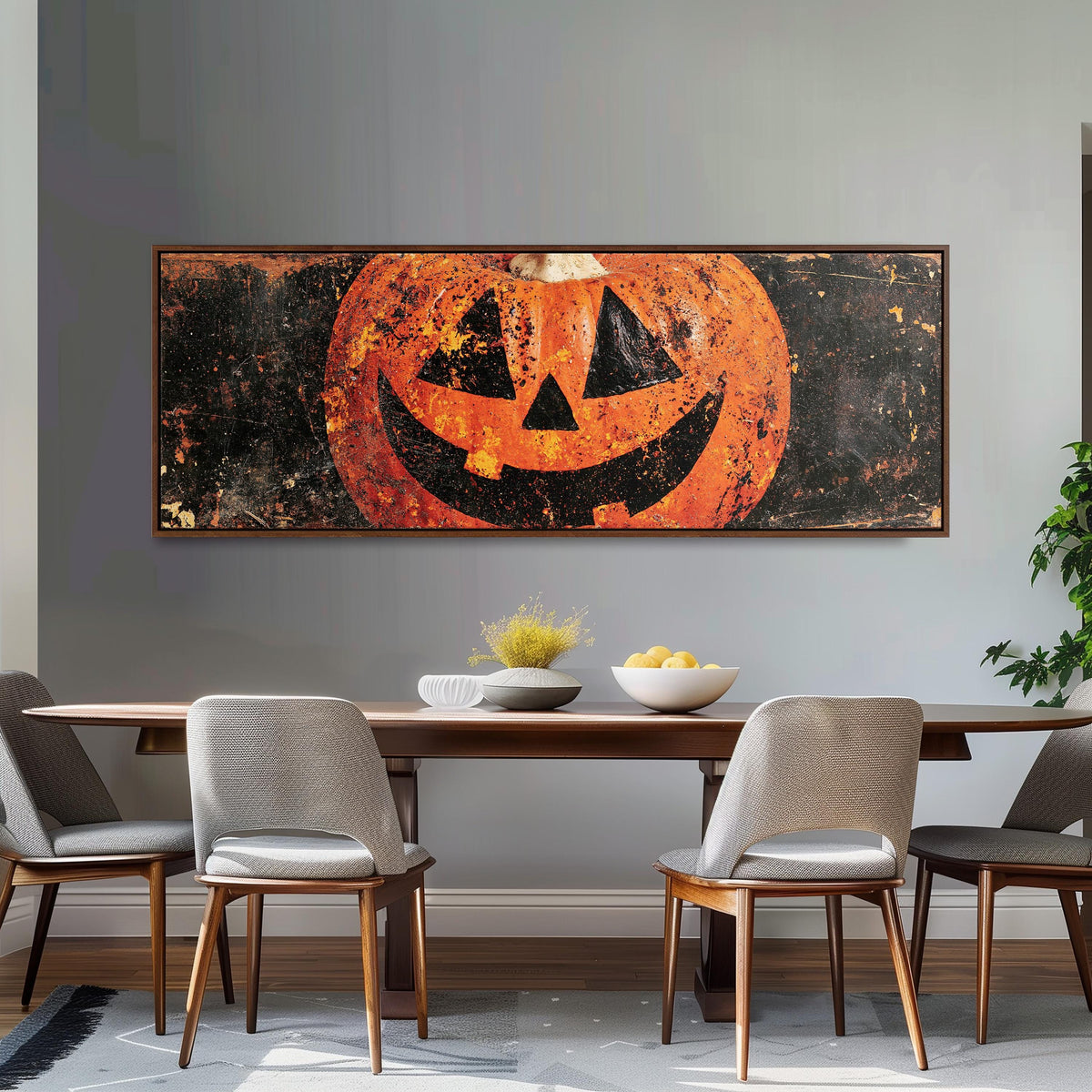Rustic distressed jack-o'-lantern long horizontal canvas print above a dining table