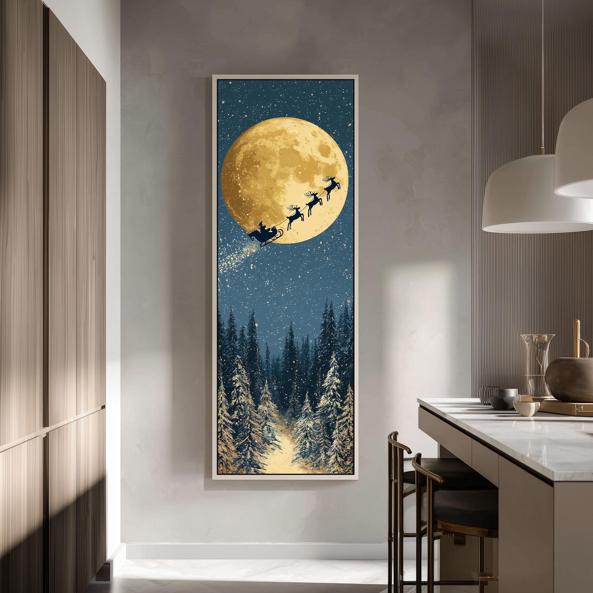 a large framed picture hanging on a wall, depicting a snowy forest scene with a full moon and reindeer flying across the night sky.