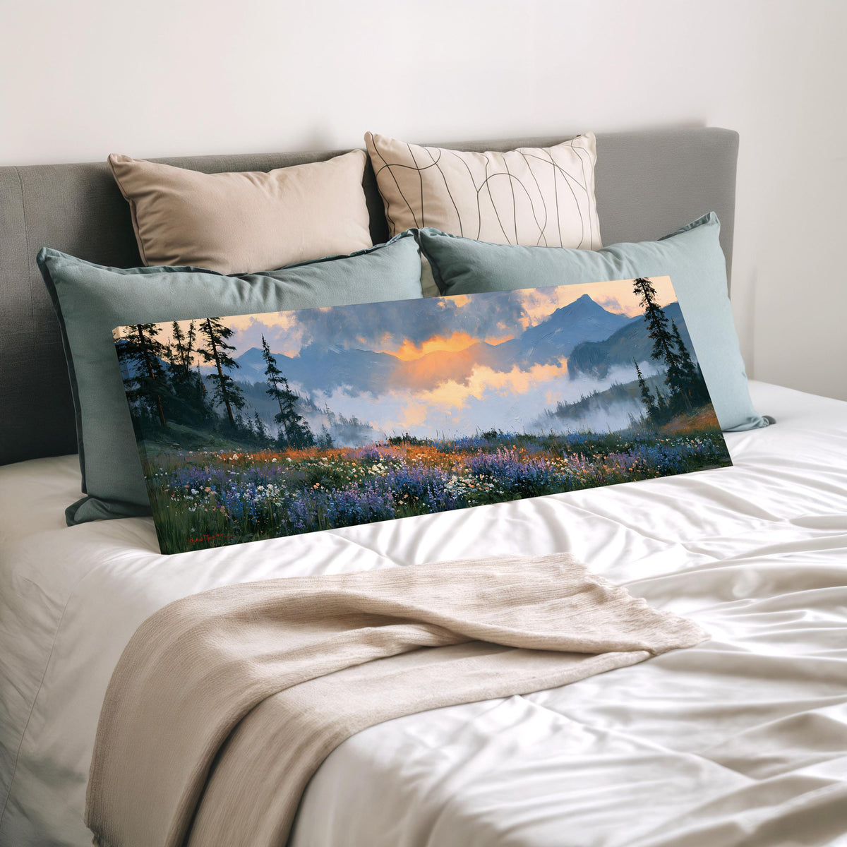 Alpine wildflower meadow at sunset wide panoramic canvas print laid on a bed to show its size