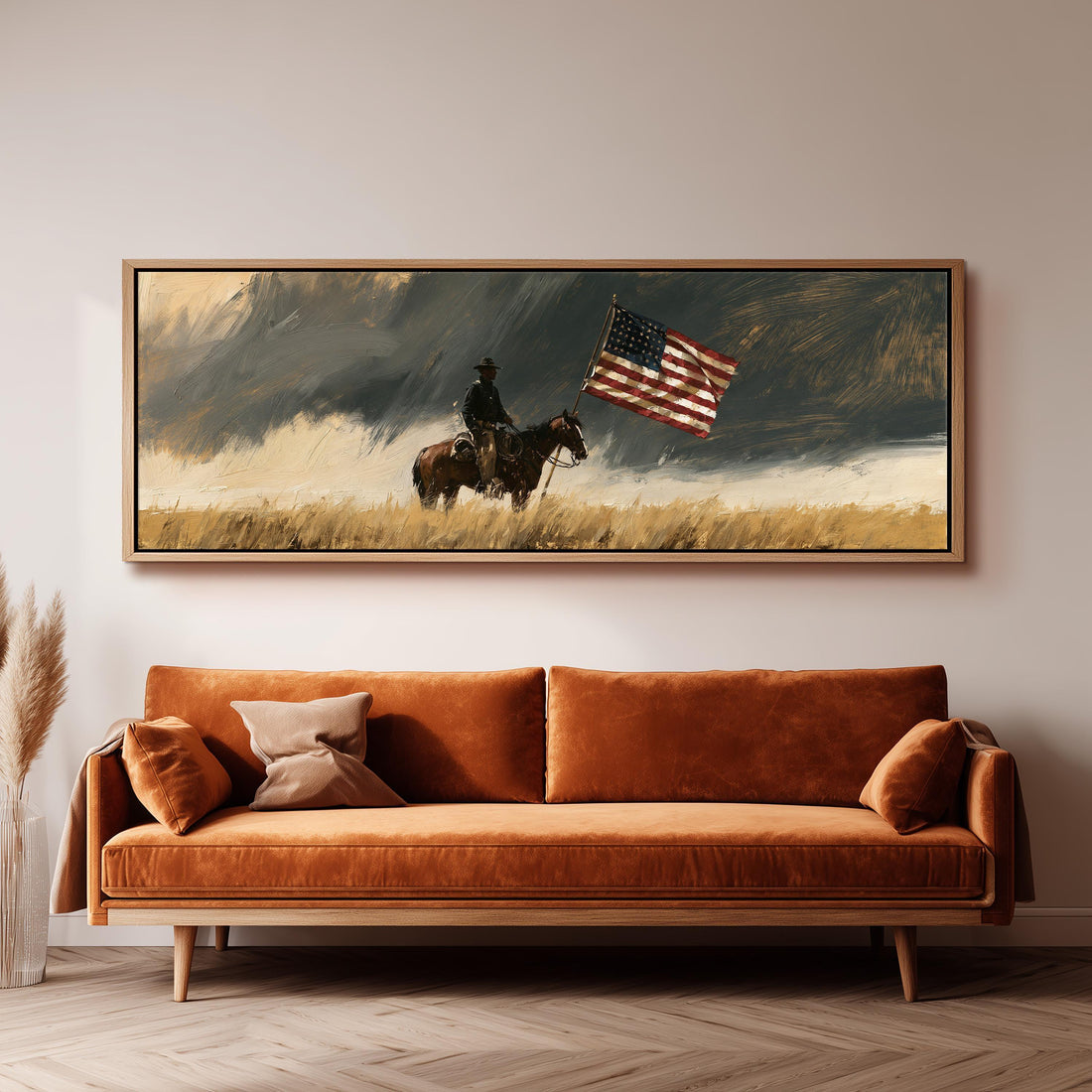 Cowboy riding with an American flag under a stormy sky long horizontal canvas print above a sofa in a living room
