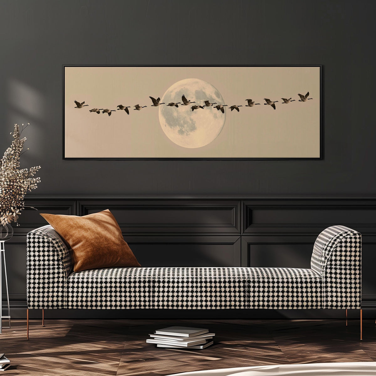 Geese flying across a pale moon on sand wide panoramic canvas print above a bench in a dark living room