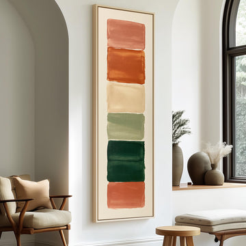 Stack of terracotta, cream and sage swatches long vertical canvas print in a sunlit living space