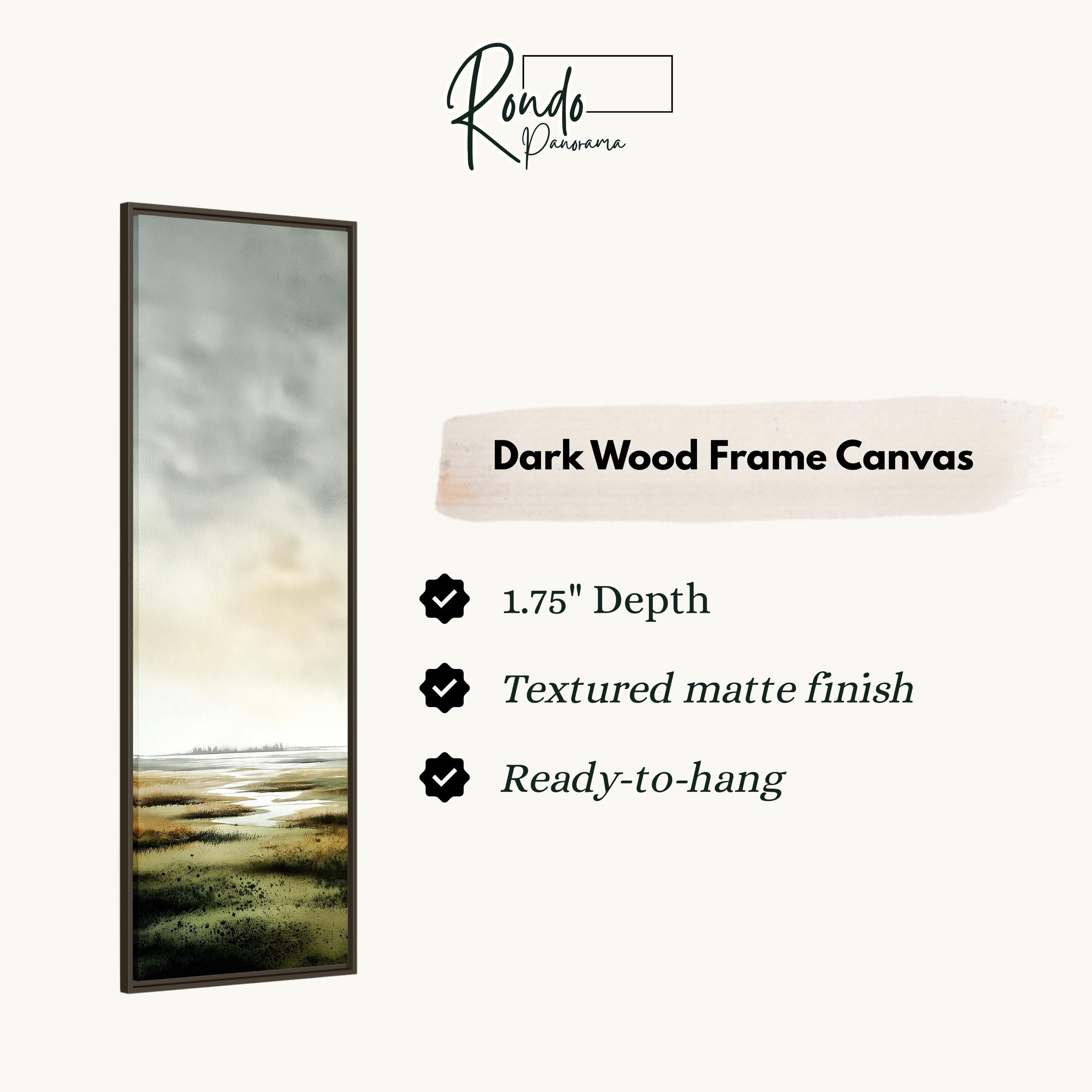 The image is a product description for a dark wood frame canvas. It features a painting of a landscape with a body of water and a cloudy sky. The canvas has a 1.75" depth, a textured matte finish, and is ready to hang.