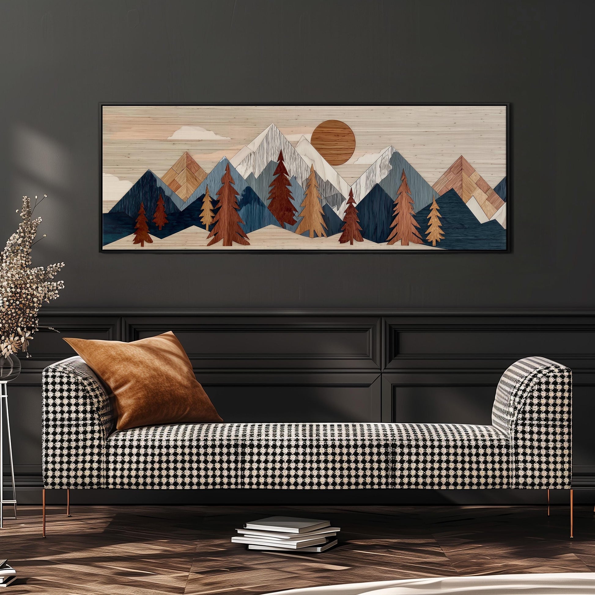 a large, rectangular artwork depicting a mountain landscape with a sun in the sky. The artwork is mounted on a wall above a black and white checkered sofa, which is positioned in front of the artwork.