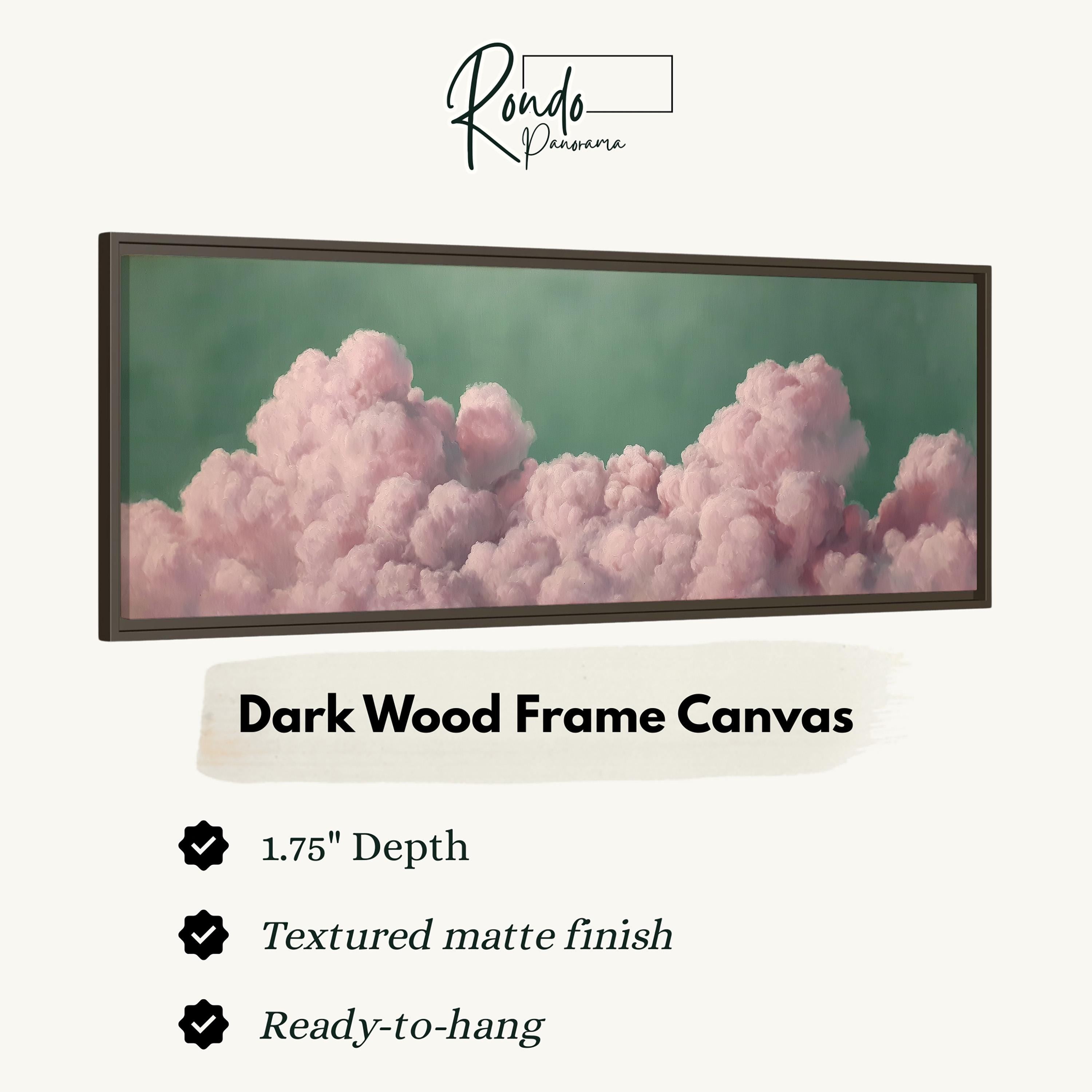 The image is a dark wood frame canvas featuring a close-up of pink clouds against a green background.