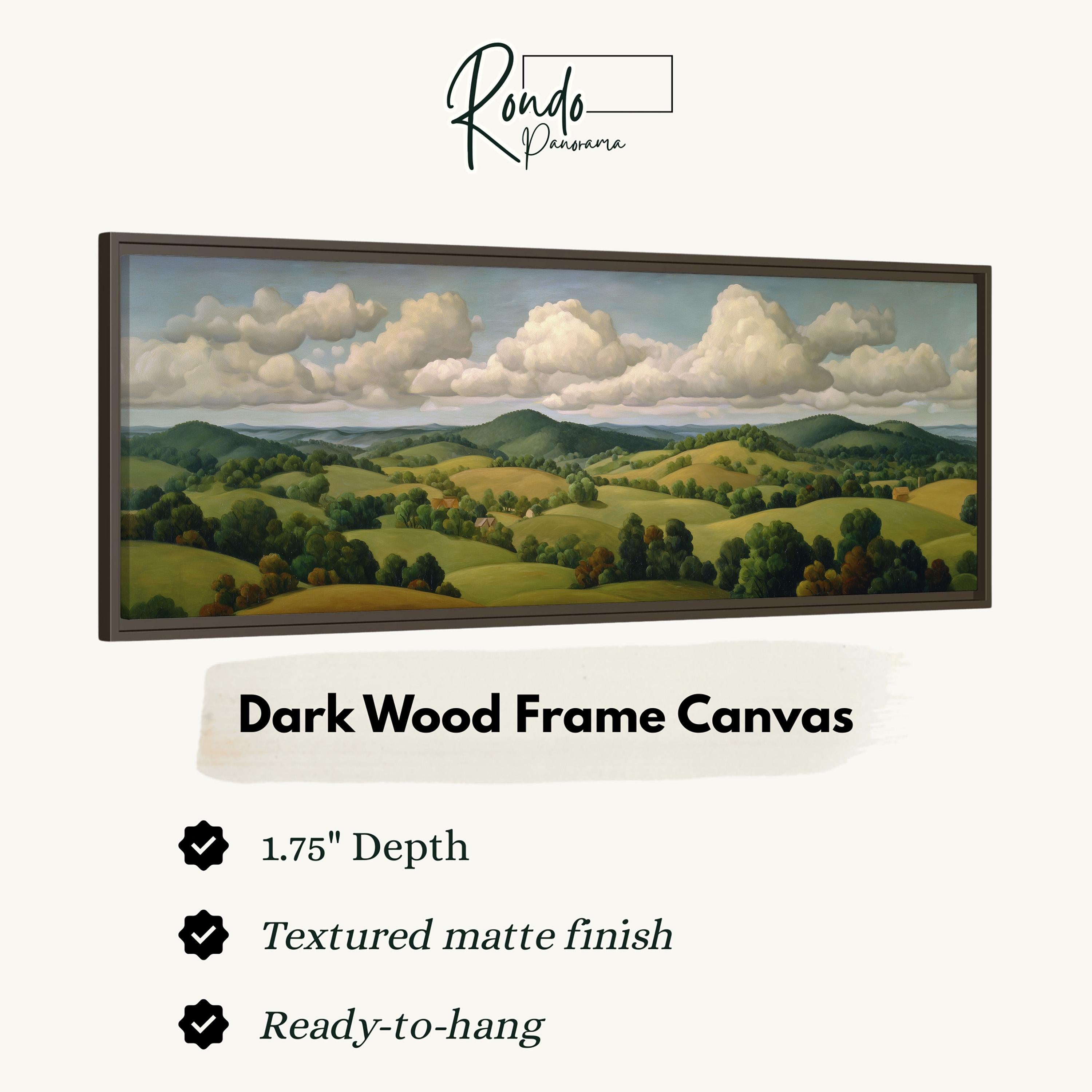 The image is a painting of a countryside landscape with rolling hills, trees, and a cloudy sky. The painting is framed in a dark wood frame and is described as a "Dark Wood Frame Canvas" with a 1.75" depth and a textured matte finish. The painting is ready to hang.