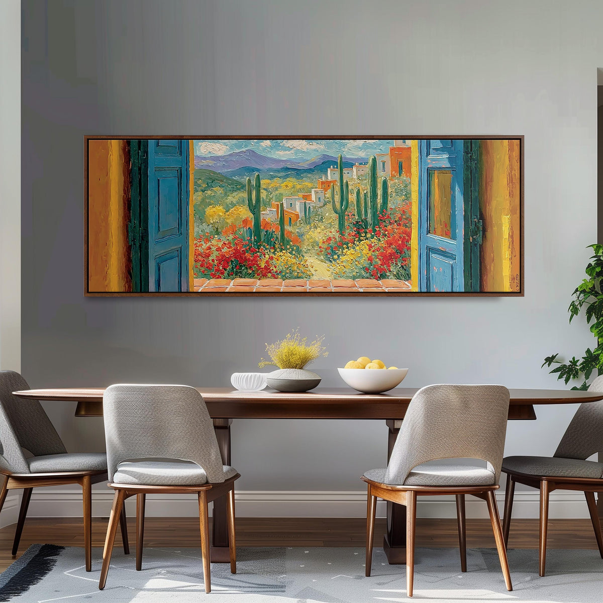 Cactus courtyard seen through blue doors long horizontal canvas print above a dining table