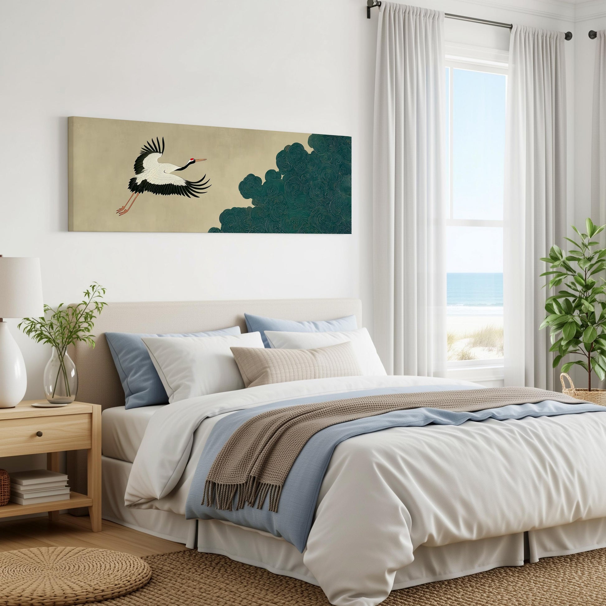 a serene bedroom with a large bed, a painting of a bird in flight, and a window overlooking the ocean.