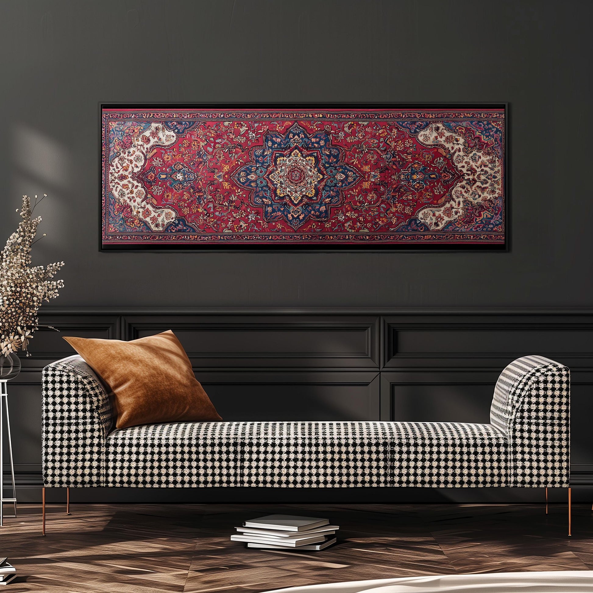 a black and white checkered sofa with a brown throw pillow, set against a dark wall with a large framed rug hanging above it.