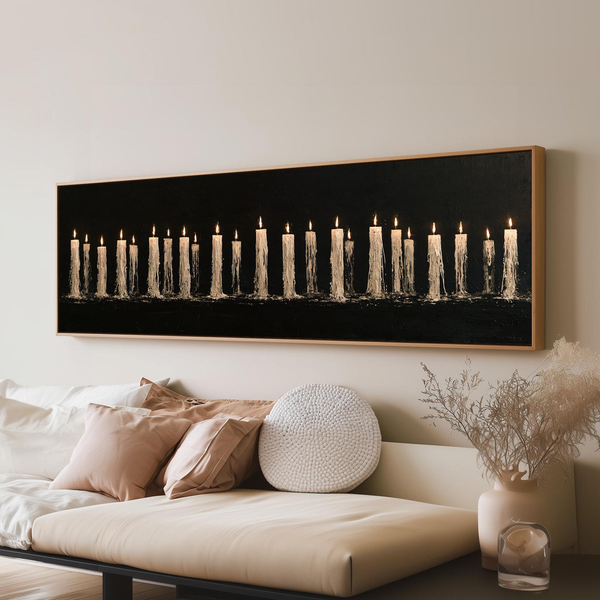 Long row of flickering candles panoramic canvas print above a sofa in a living room