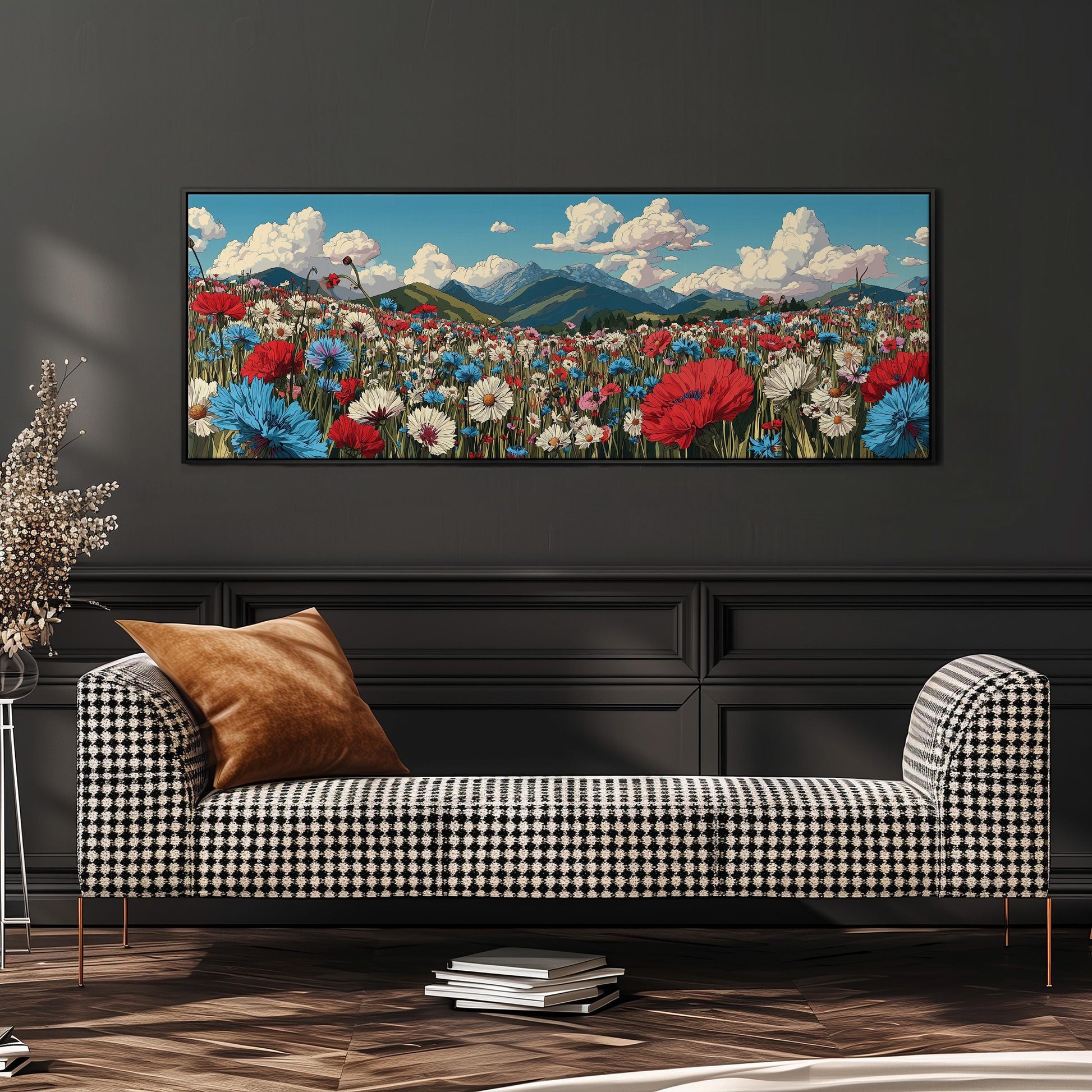 a large, colorful painting of a flower field hanging on a wall above a black and white checkered sofa.