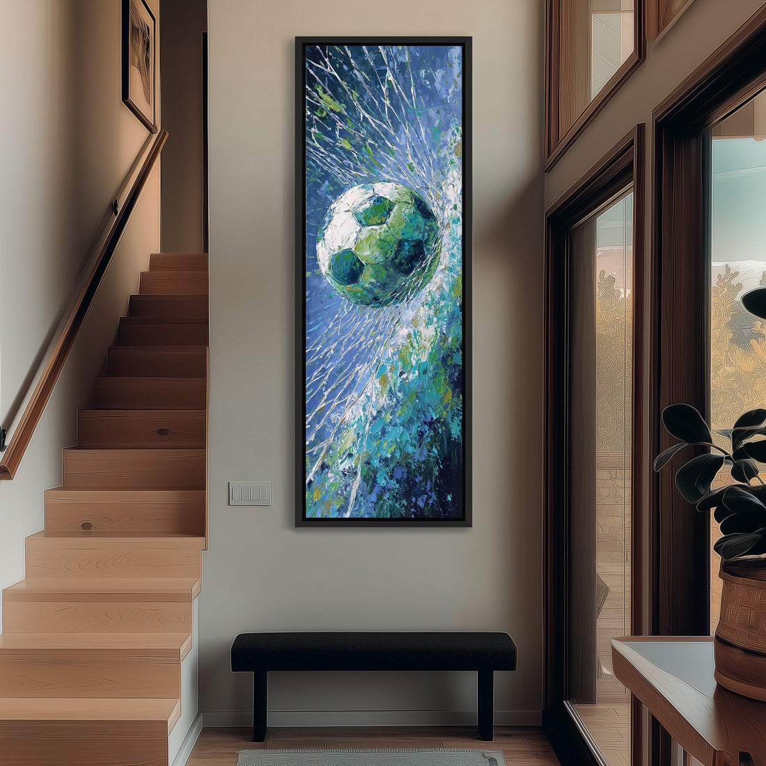 a large, colorful painting of a soccer ball suspended in mid-air, with a blue and green background and a white and green soccer ball. The painting is hanging on a wall in a room with a wooden cabinet and a vase of flowers.