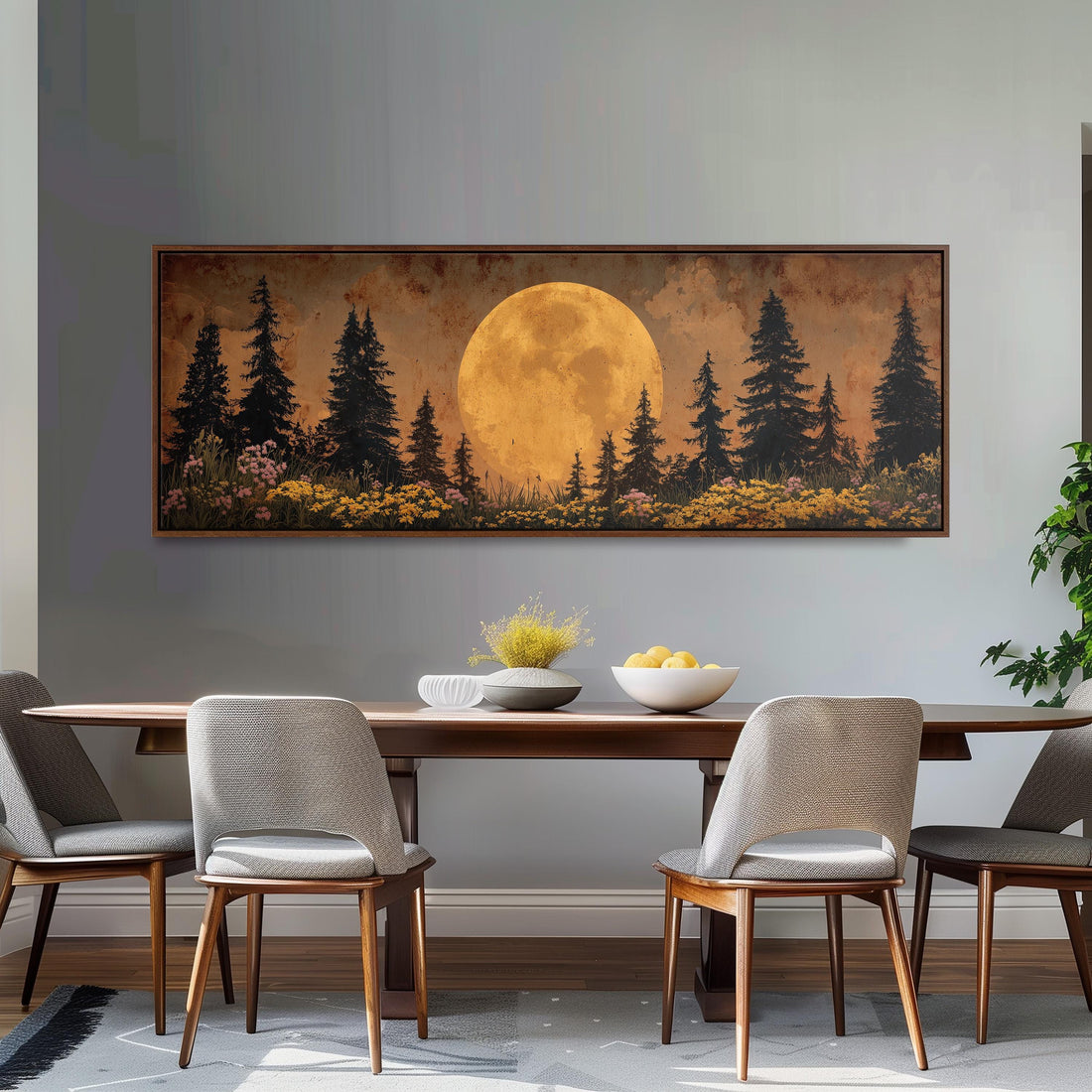a large, framed painting of a nighttime landscape with a full moon and pine trees, hanging on a wall above a black and white checkered sofa.