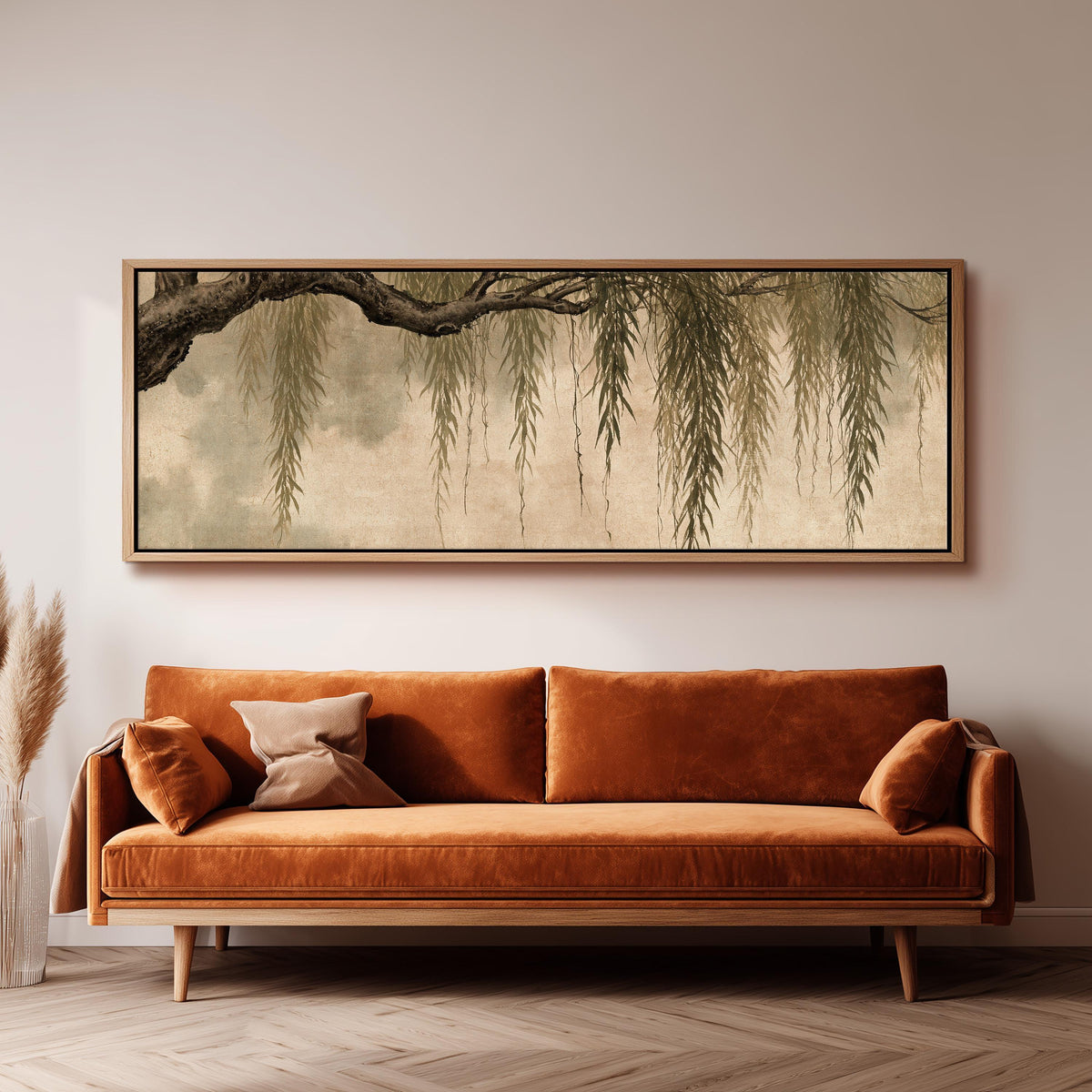 Hanging willow branches panoramic canvas print above a sofa in a living room