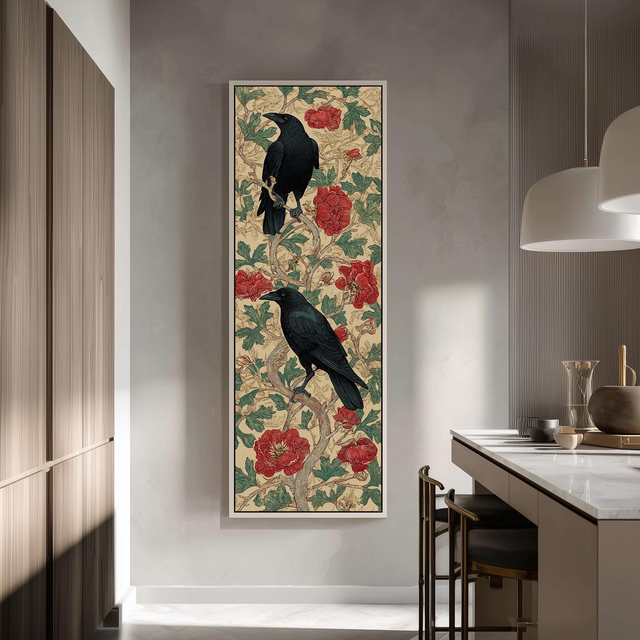 a large framed artwork of two black birds perched on a branch with red flowers, hanging on a wall in a modern kitchen.