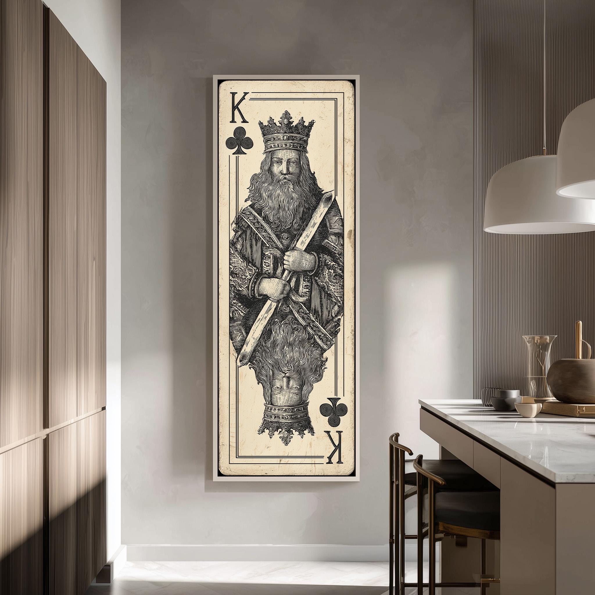 a large framed artwork depicting a king, with the king wearing a crown and holding a club in his hand.