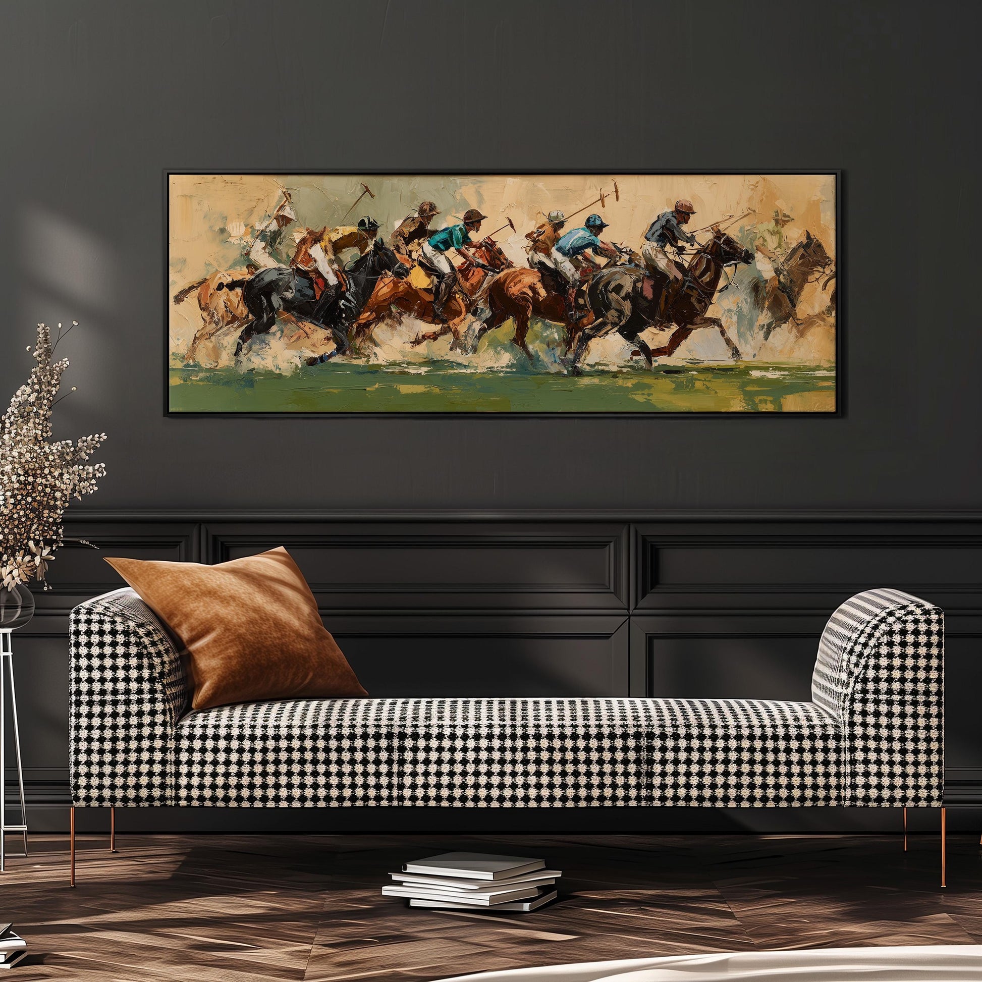 a large painting of a group of people riding horses, with a checkered sofa in the foreground.