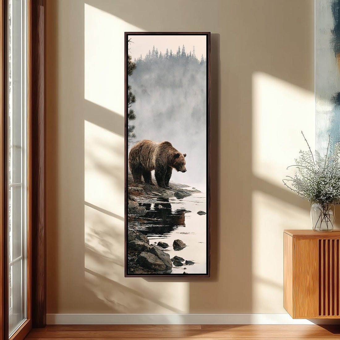 Brown bear on a rocky misty lakeshore long vertical canvas print in a sunlit living space