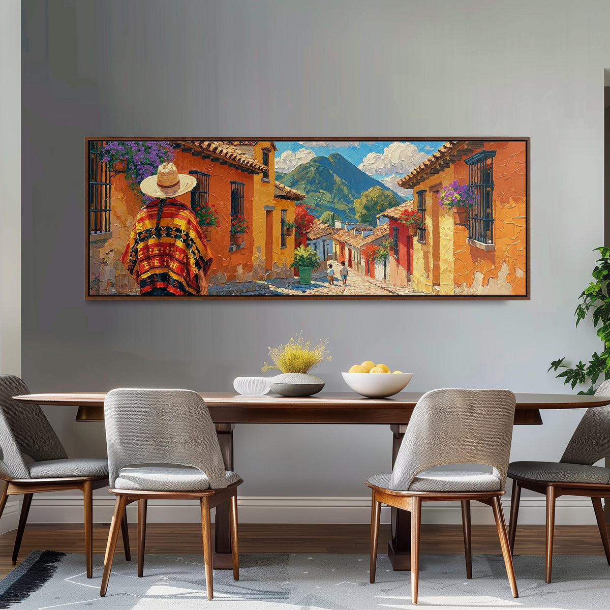 Colorful Guatemalan street with volcano view long horizontal canvas print above a dining table