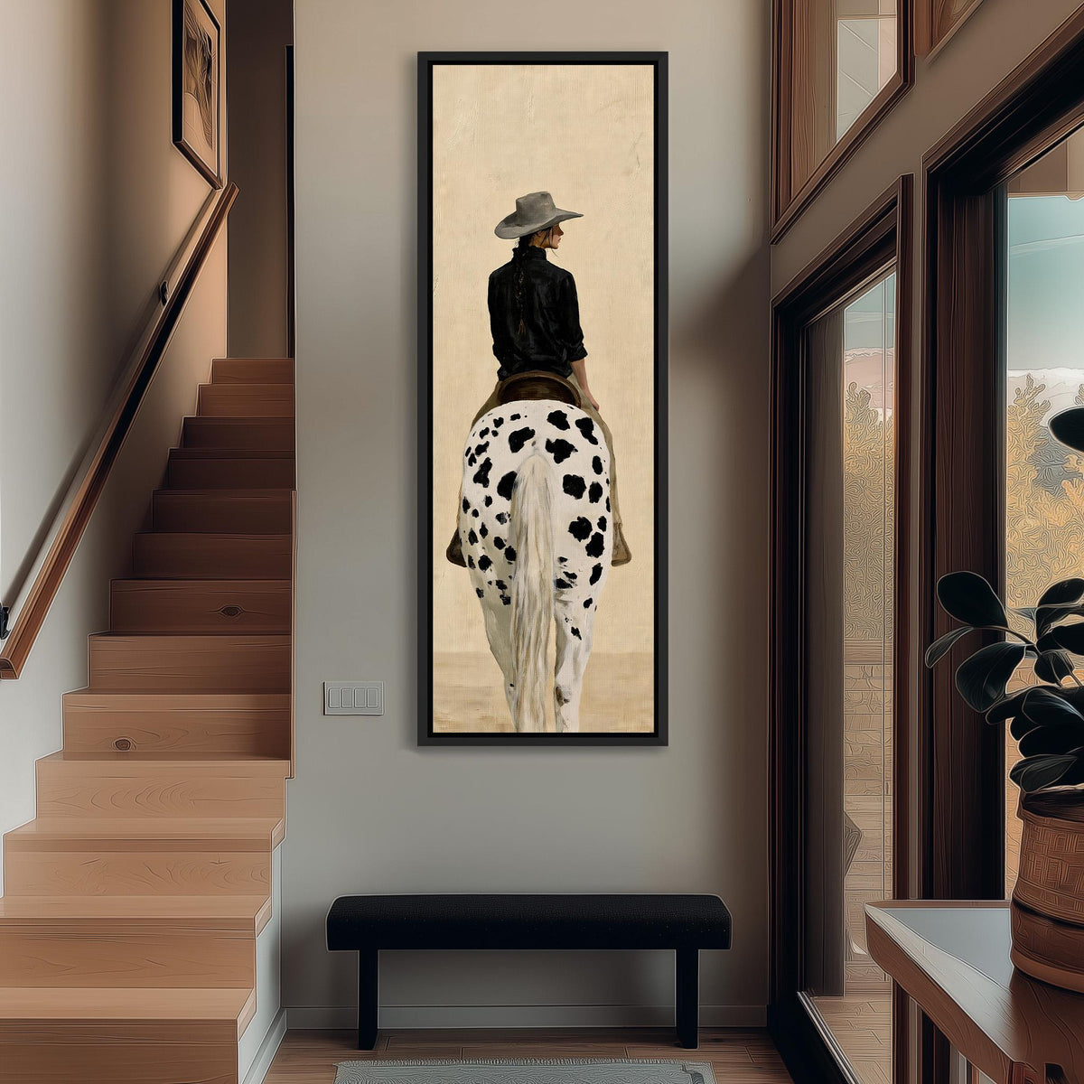 Cowgirl with a long braid on a spotted horse tall narrow canvas print beside a staircase in an entryway