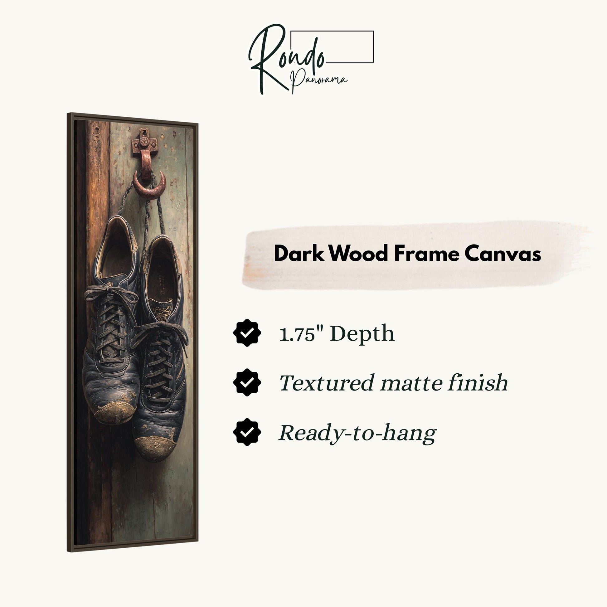 a pair of old, worn black shoes hanging on a wooden wall.
