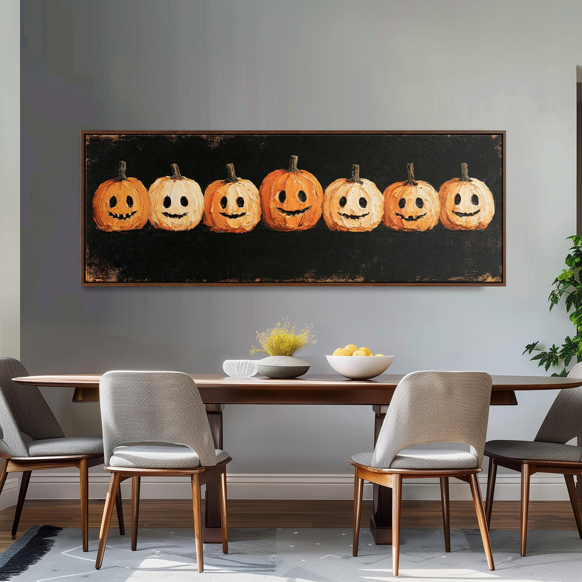 Row of smiling jack-o'-lanterns long horizontal canvas print above a dining table