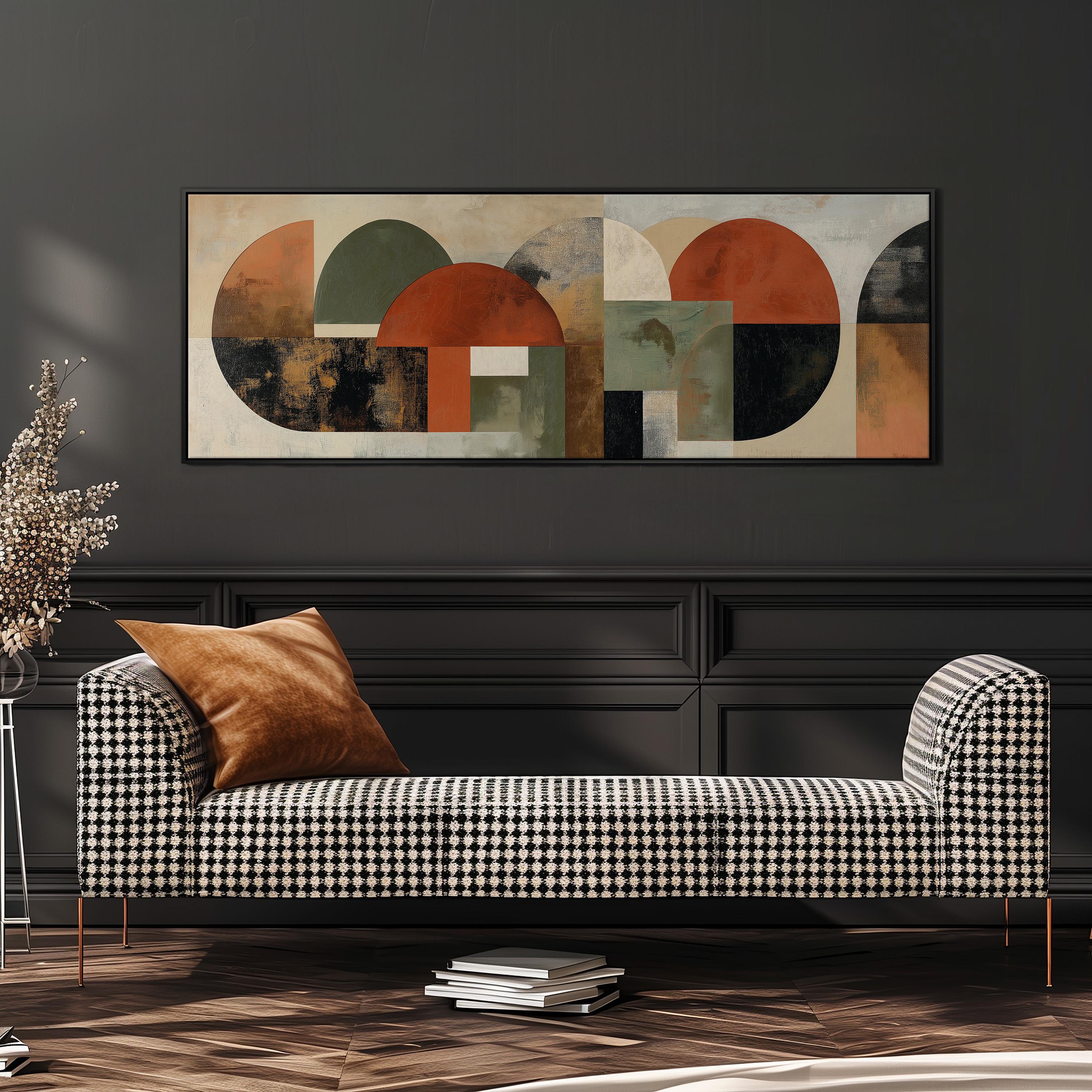 a modern living room with a black and white checkered sofa, a large abstract painting on the wall, and a stack of books on the floor.
