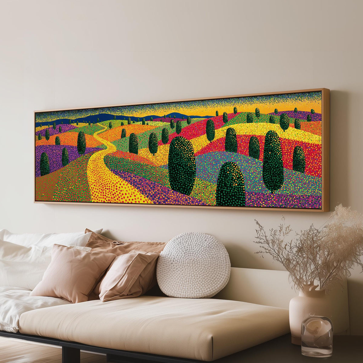 Colorful dotted garden with a winding path long horizontal canvas print above a sofa in a living room