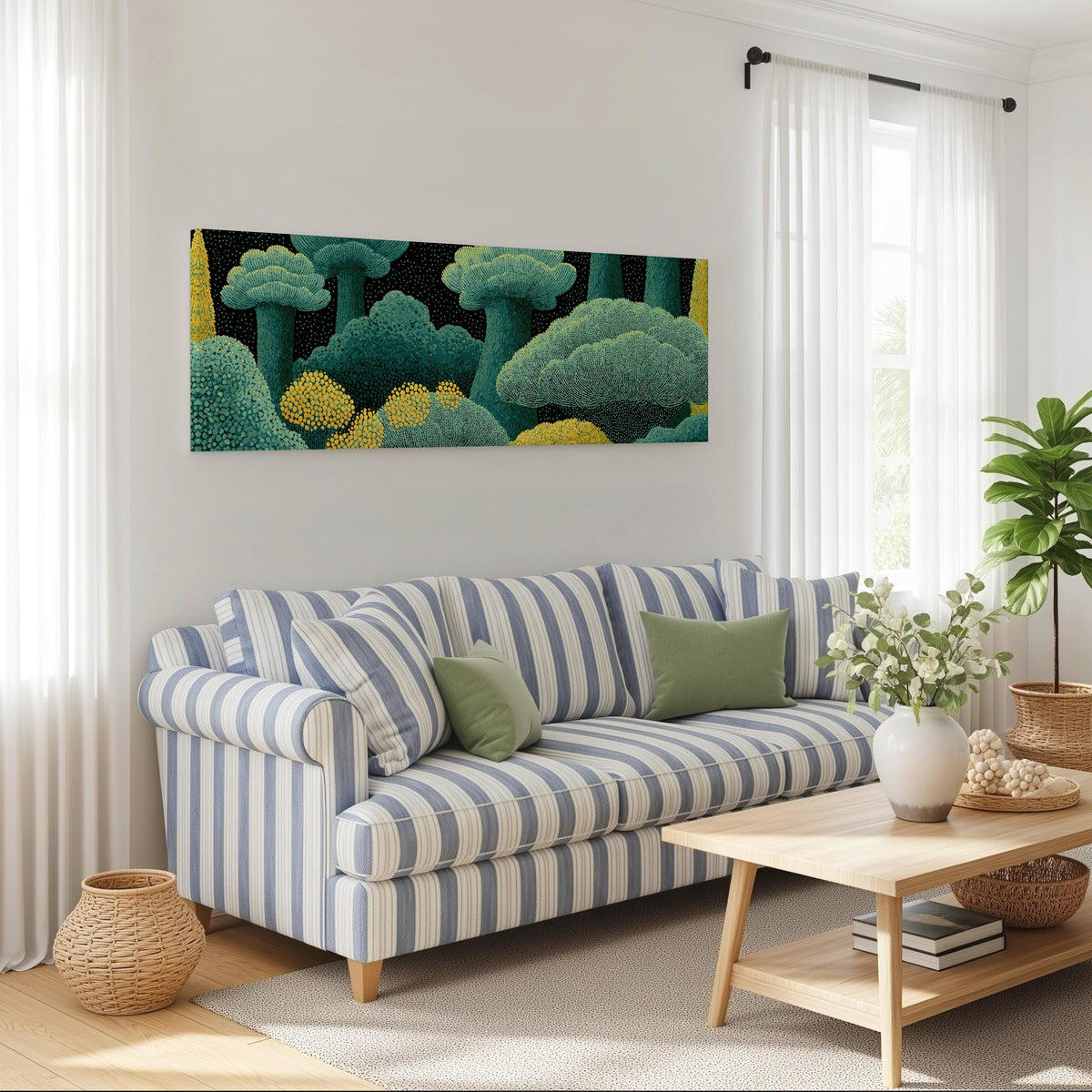 Teal dotted treetops long horizontal canvas print above a striped sofa in a coastal living room