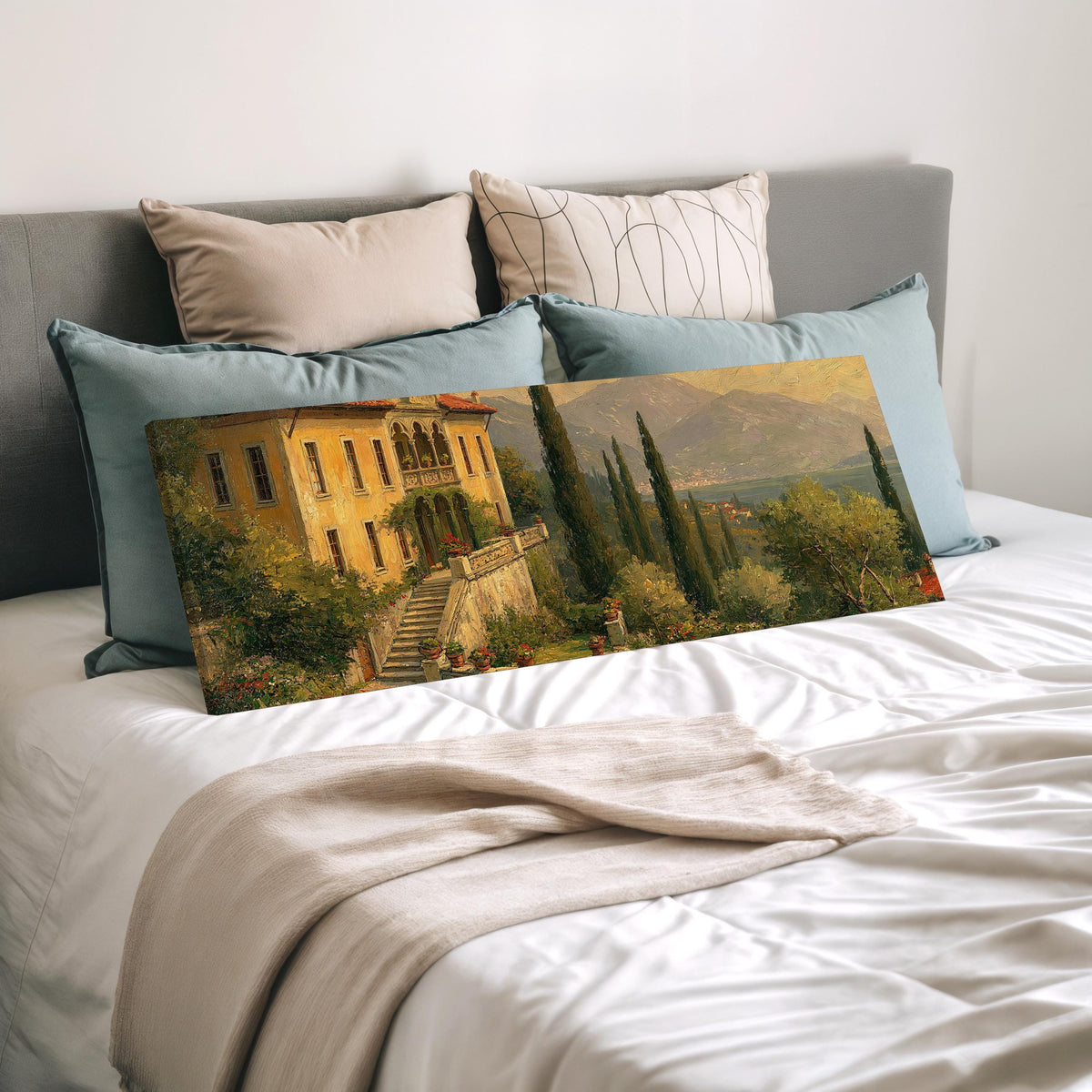 Tuscan villa among cypress hills wide panoramic canvas print laid on a bed to show its size