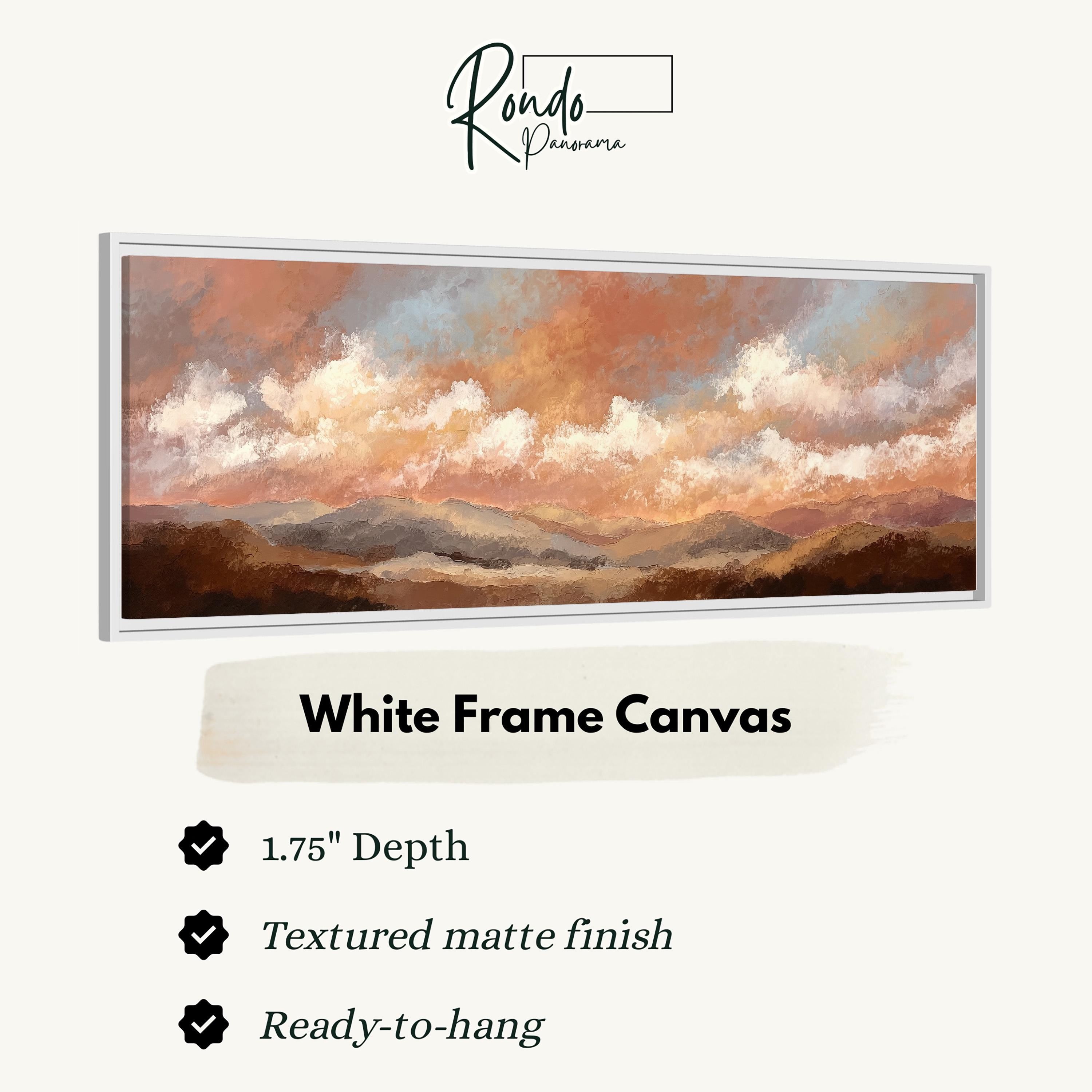 The image is a white frame canvas depicting a landscape with mountains and clouds.