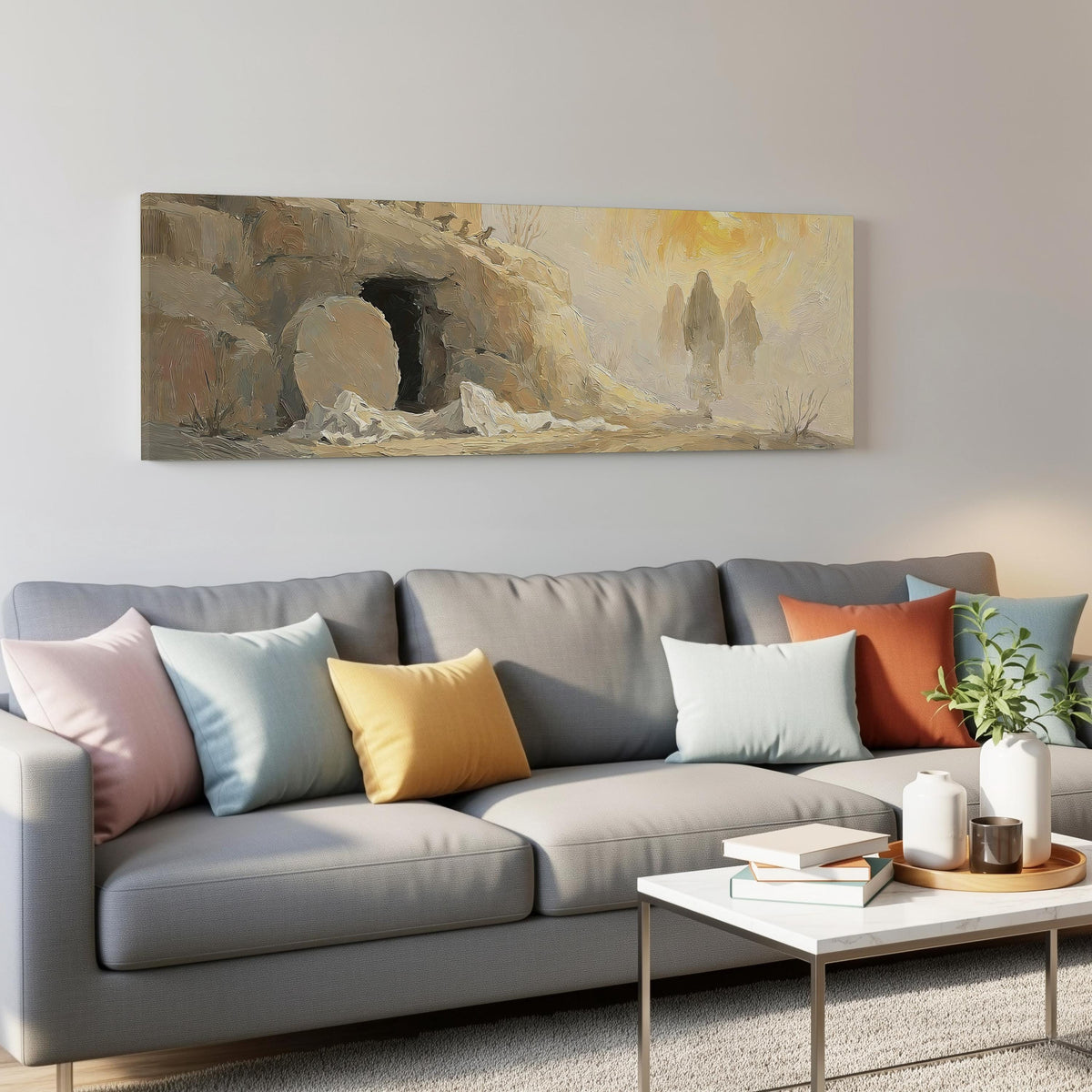The empty tomb at sunrise panoramic canvas print above a grey sofa in a living room