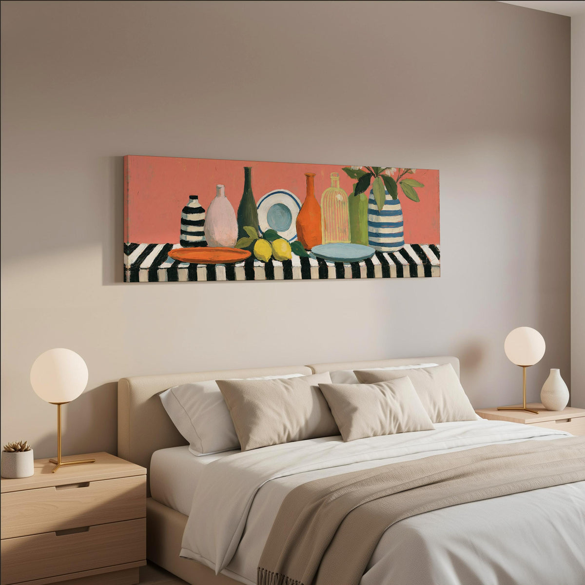 Bottles and lemons still life wide panoramic canvas print above a bed in a neutral bedroom