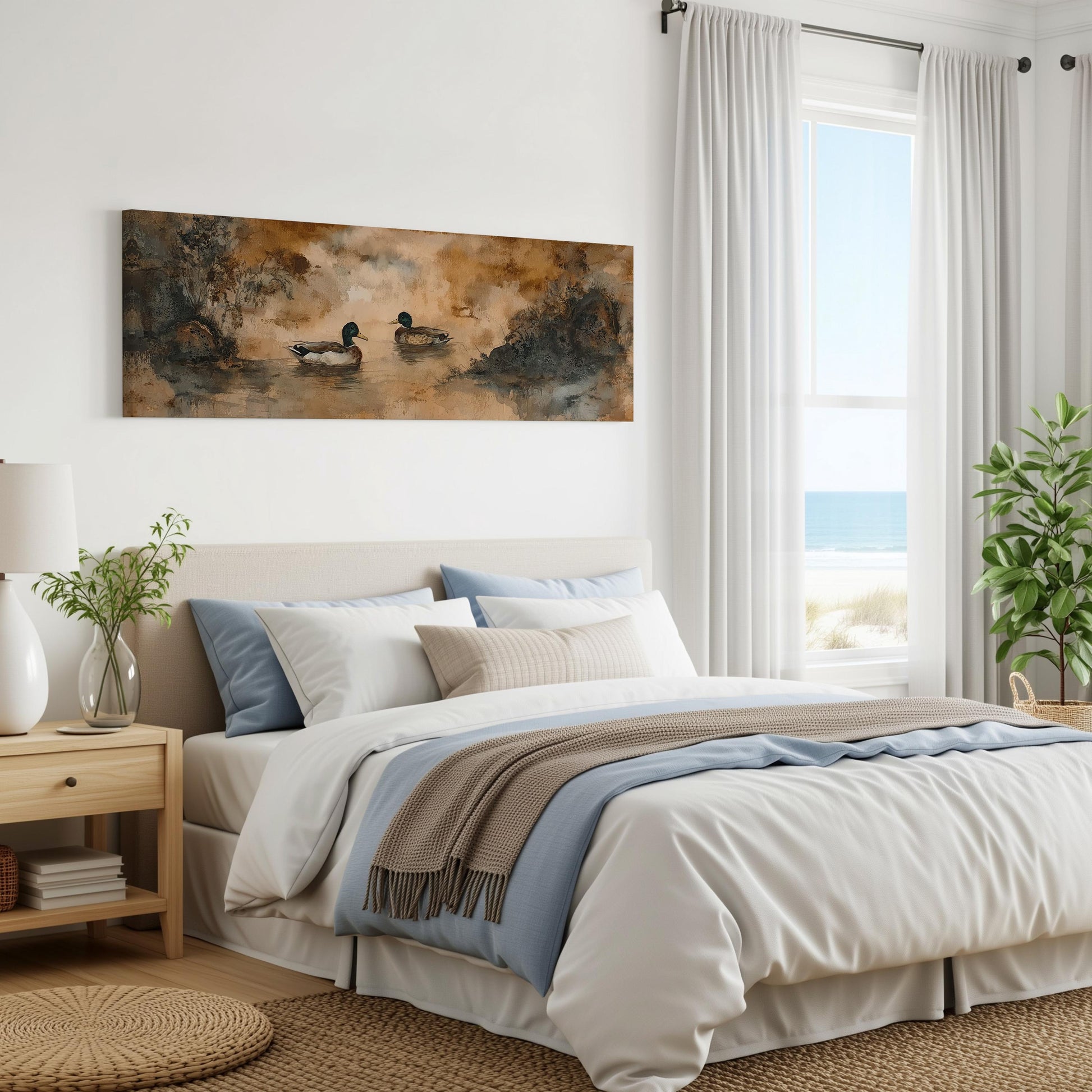 a serene bedroom scene with a large bed, a painting of ducks on the wall, and a window overlooking the ocean.