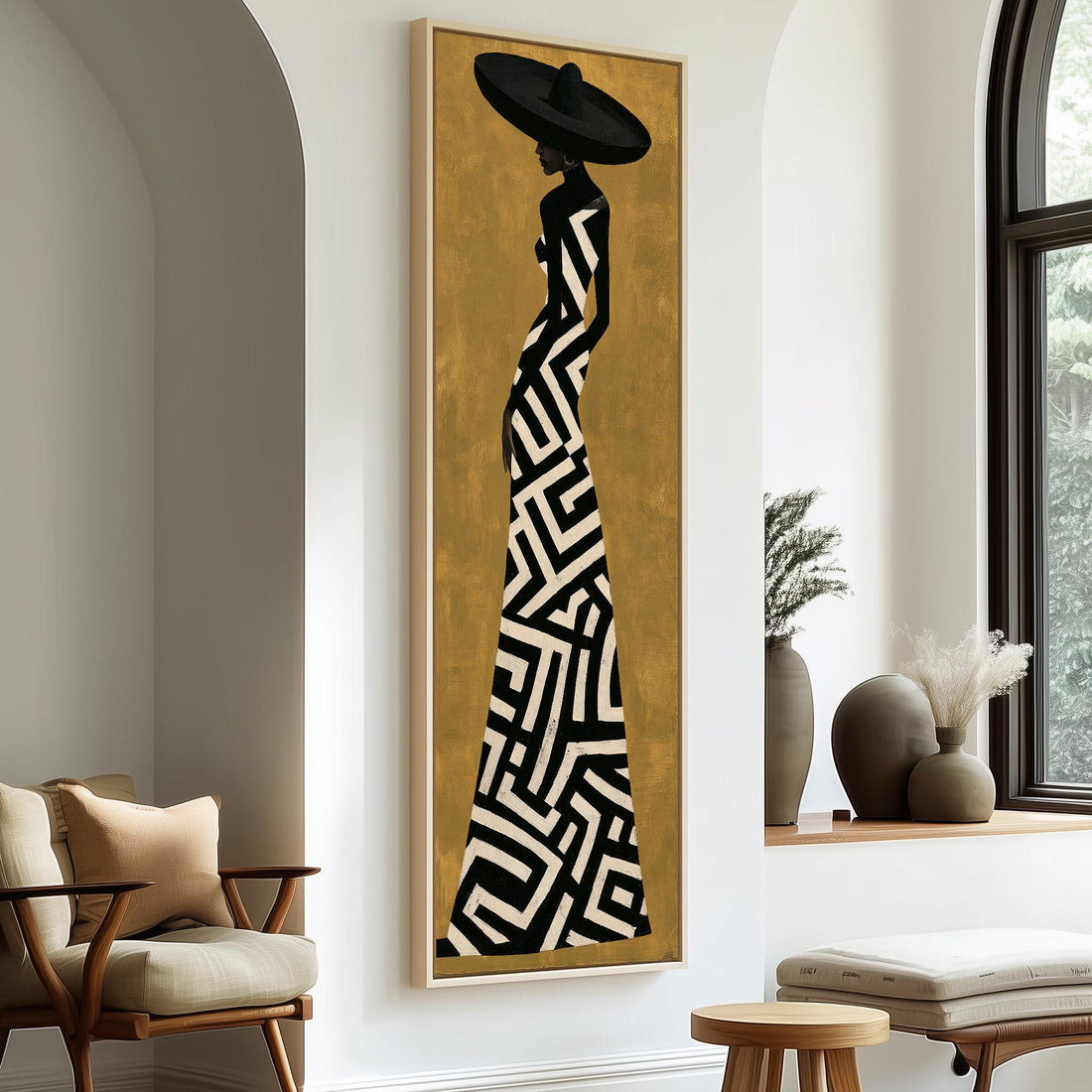 Woman in a geometric gown and wide hat on gold long vertical canvas print in a sunlit living space