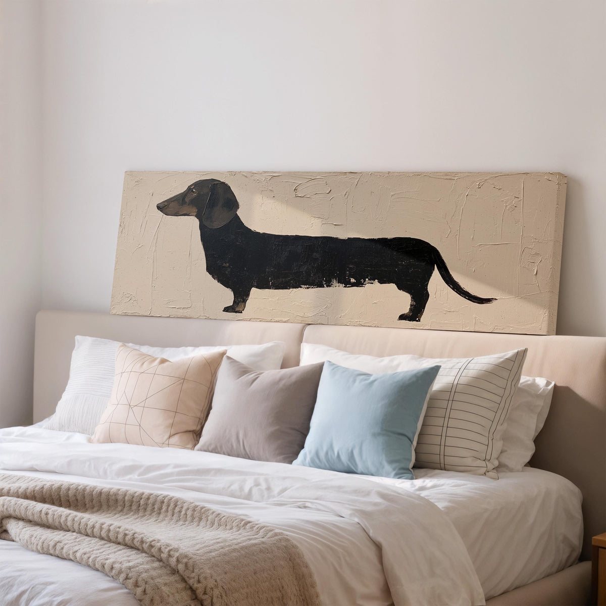 Black dachshund silhouette wide panoramic canvas print above a bed in a bedroom